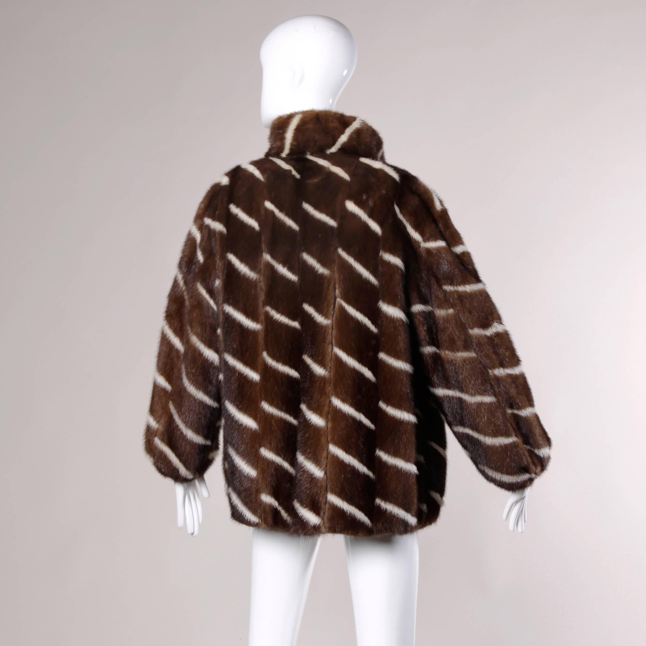 Striped brown and white mink fur coat with leather lining and oversize fit.

Details:

Fully Lined
Front Hook Closure
Marked Size: Not Marked
Estimated Size: S/M/L (Oversize Fit)
Color: Brown/ White
Fabric: Genuine Mink Fur/ Leather
Label: