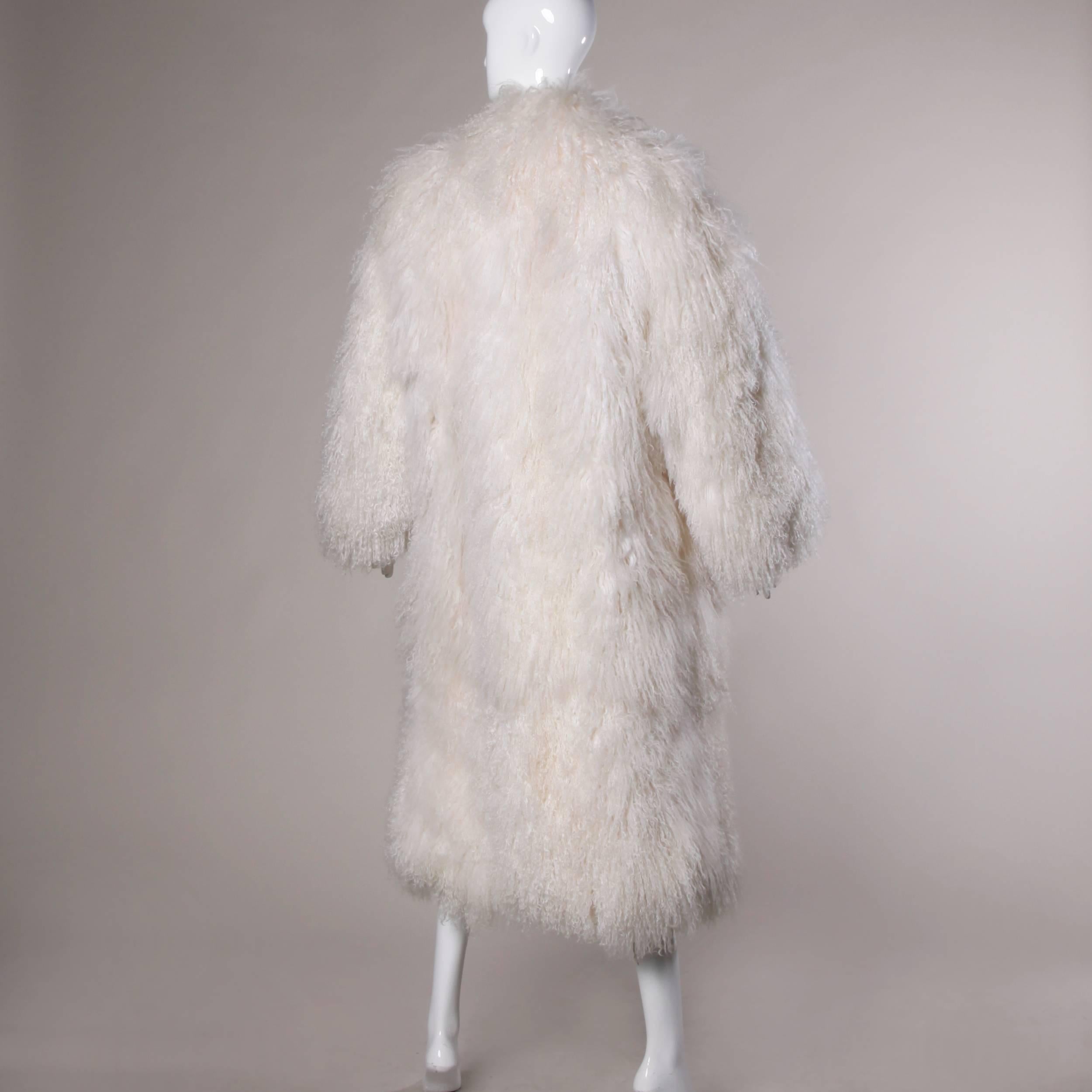 white shaggy fur coat