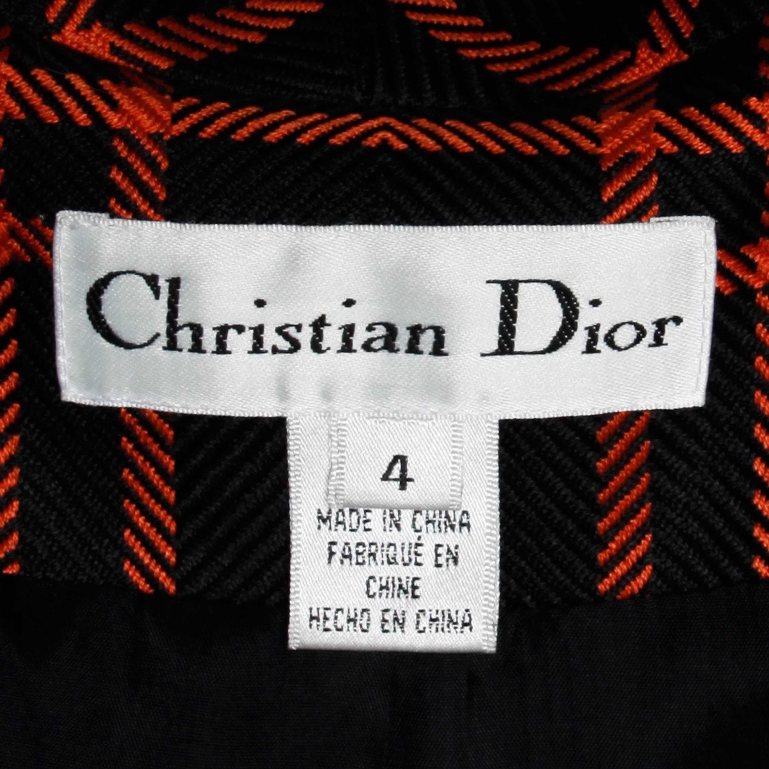 Chic orange and black plaid blazer jacket by Christian Dior.

Details:

Fully Lined
Front Button Closure
Marked Size: 4
Estimated Size: Small
Color: Orange/ Black
Fabric: 100% Silk/ 100% Acetate
Label: Christian
