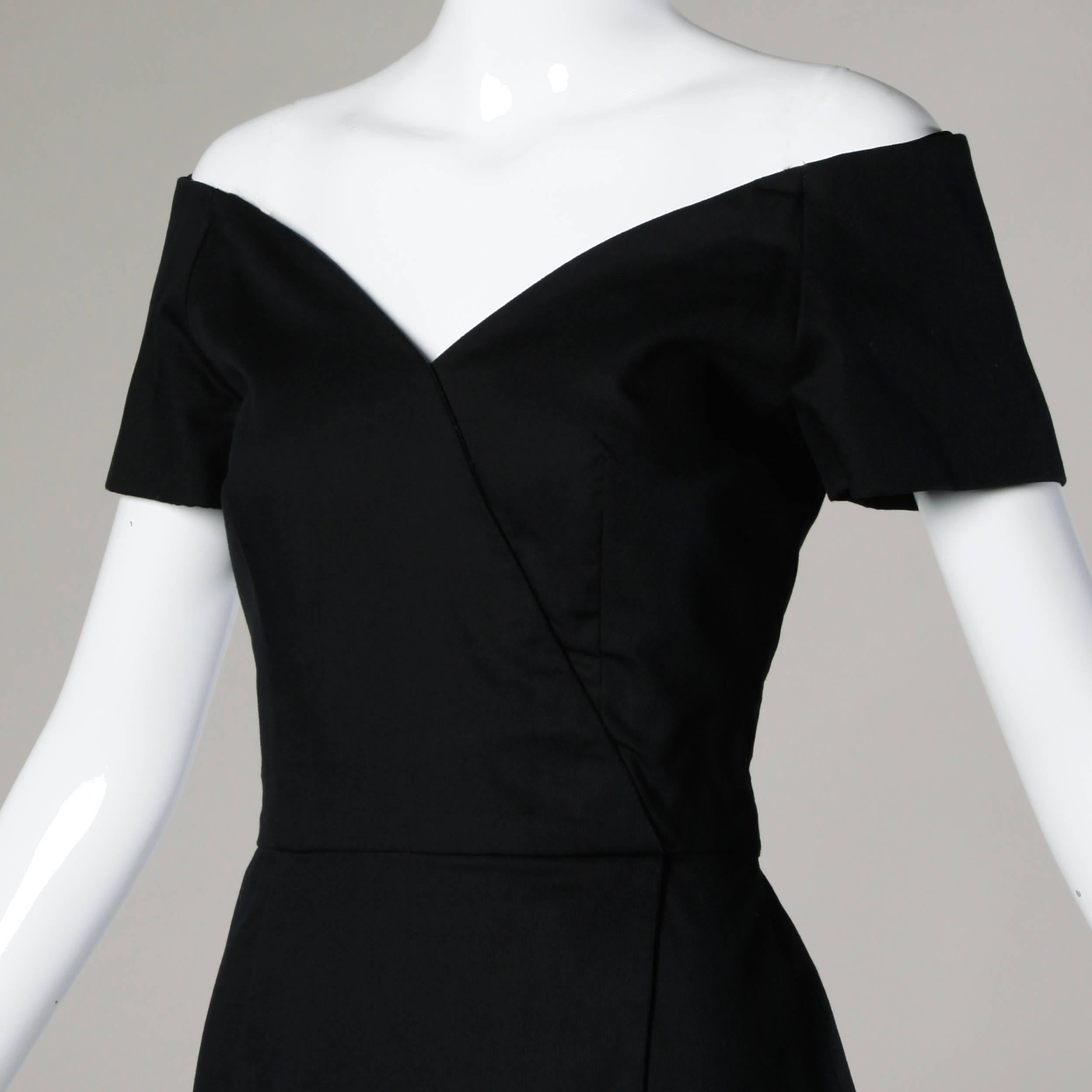 Vintage little black dress by Arnold Scaasi. Off-the-shoulder straps and hourglass silhouette.

Details:

Fully Lined
Back Zip and Hook Closure
Marked Size: Not Marked
Estimated Size: XS
Color: Black
Fabric: Not Marked
Label: Scaasi Nights
