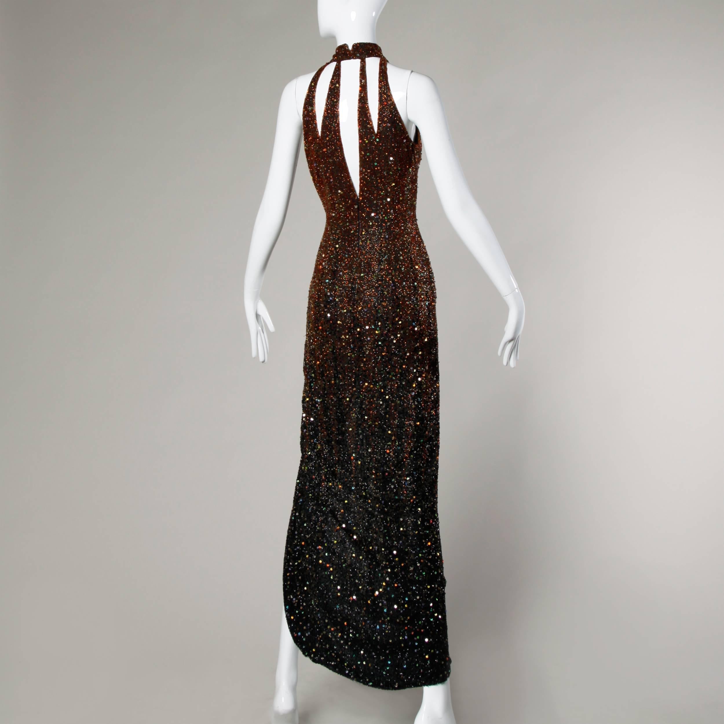 Incredible heavily beaded silk gown in with ombre sequin and beadwork that gets darker towards the bottom of the dress. Cut out detail and side slit.

Details:

Fully Lined
Back Zip and Hook at Neck Closure
Marked Size: US 2
Estimated Size: