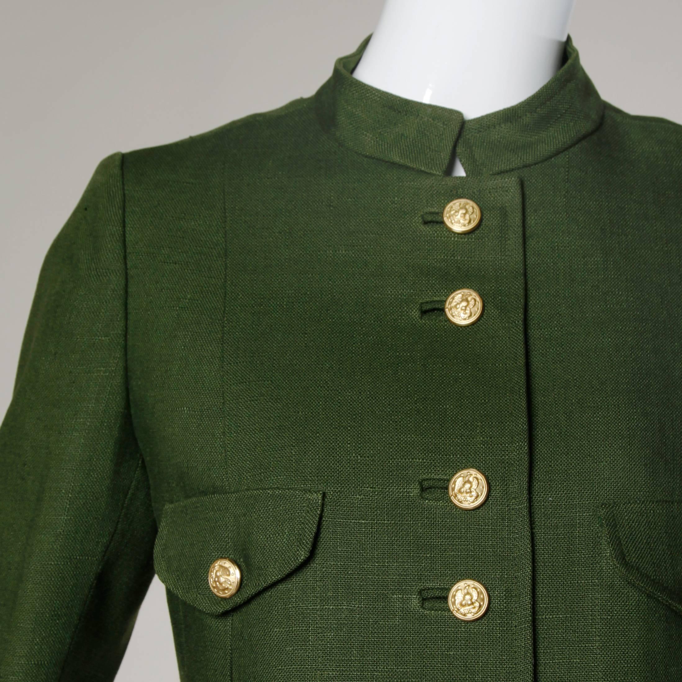 Pristine tailored military-inspired jacket in olive green by Modelia for Bergdorf Goodman. Heavy brass buttons and bound button holes.

Details:

Fully Lined
Front Button Closure
Marked Size: Not Marked
Estimated Size: Medium
Color: Olive