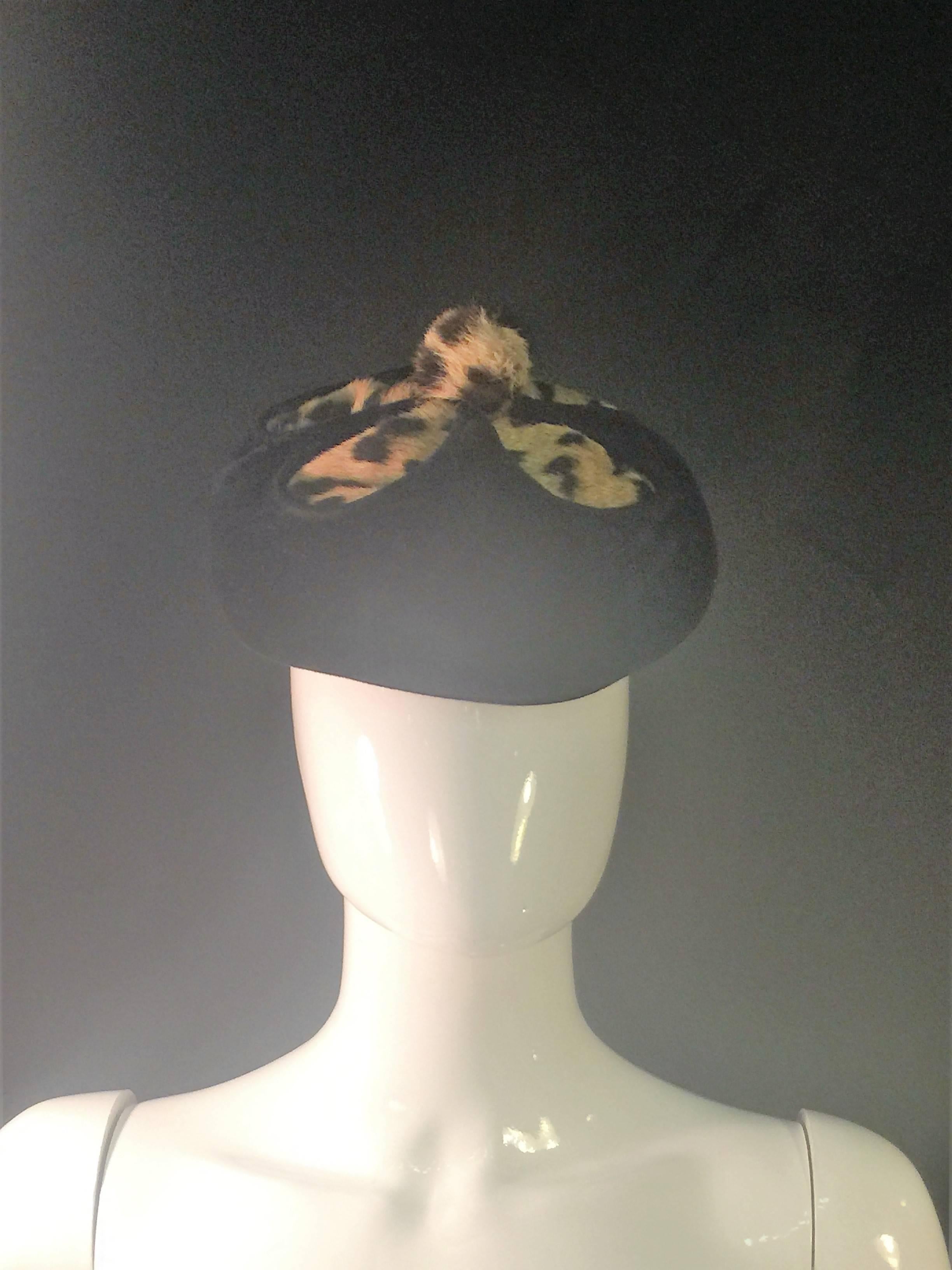Great Design Black Fur Velour Hat decorated with Leopard Printed Fur and center Pom Pom.