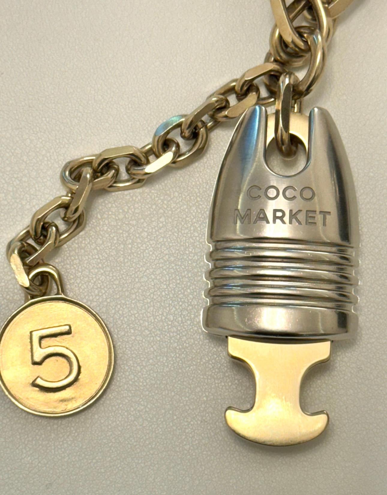 Rara collana bicolore in argento e oro della collezione Supermarket di Chanel 2014. Icone di questa collezione