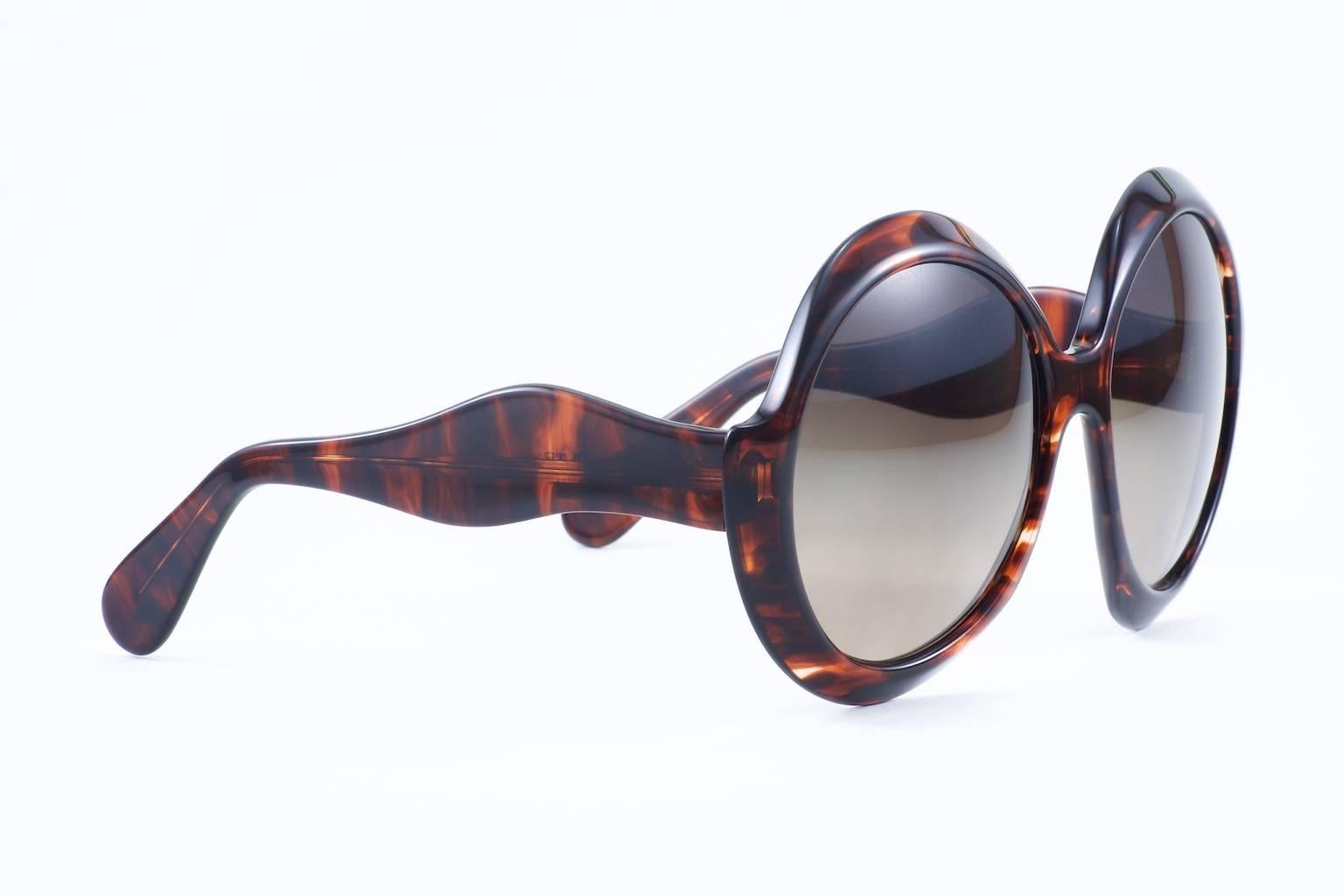 This is a Jackie O style vintage sunglasses. Produced in the 1970’s disco era, this model was named “Sudan” by Ultra. The lenses are new and of optical quality, UV/UVA protection.
Ultra was founded in 1947 and they produced eyewear collectively from