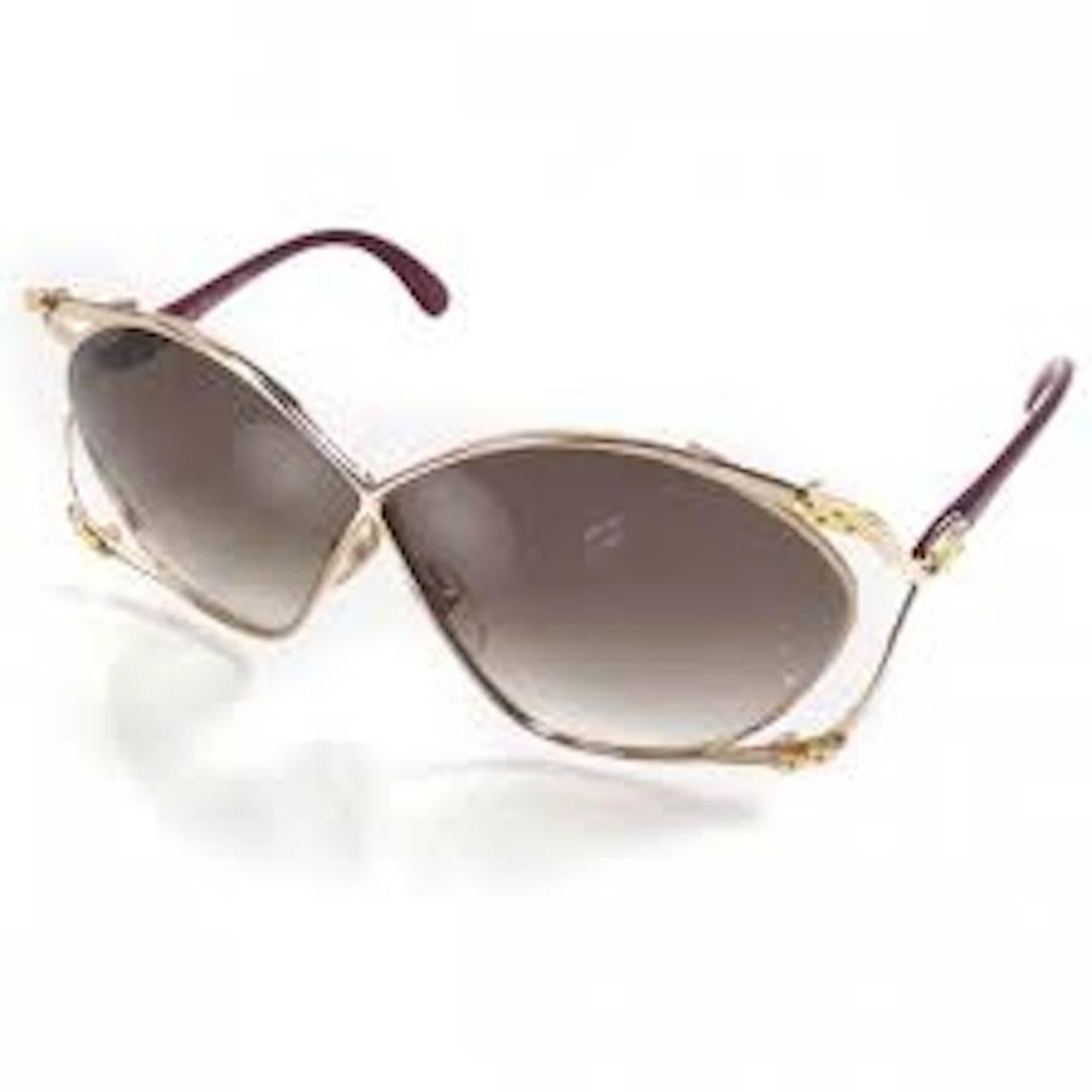 This is a authentic pair of CHRISTIAN DIOR Vintage Butterfly Sunglasses 2056. These sunnies recall the golden age of 70's fashion, the Cote d'Azure, and the fashions of Dior at its most frivolous and care-free. These glasses are stylish once again