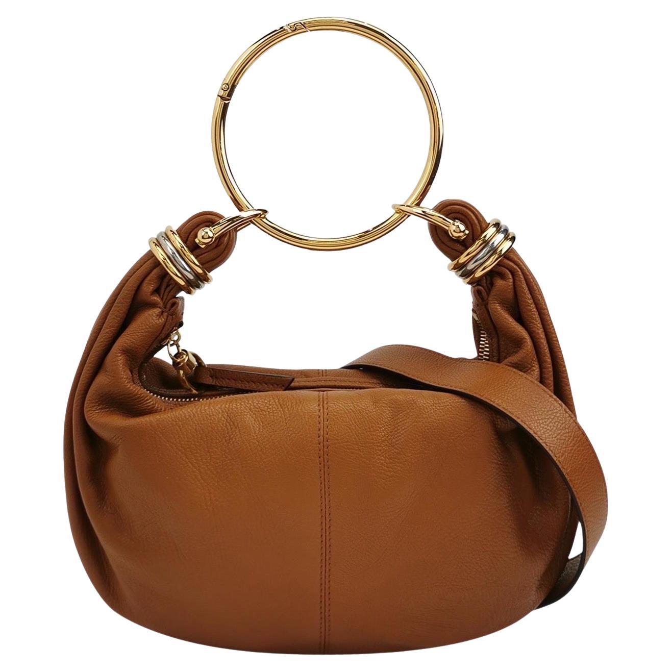 CHLOÉ Bracelet Embellished Brown Glossed Textured-leather Shoulder Bag For Sale