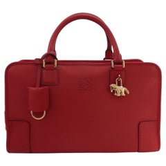 Loewe Amazona 36 Media in pelle rossa con chiusura a cavallo e hardware dorato