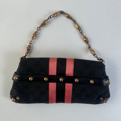 Petit sac à bandoulière Gucci Horsebit 1955 en toile noire avec motif Web rose