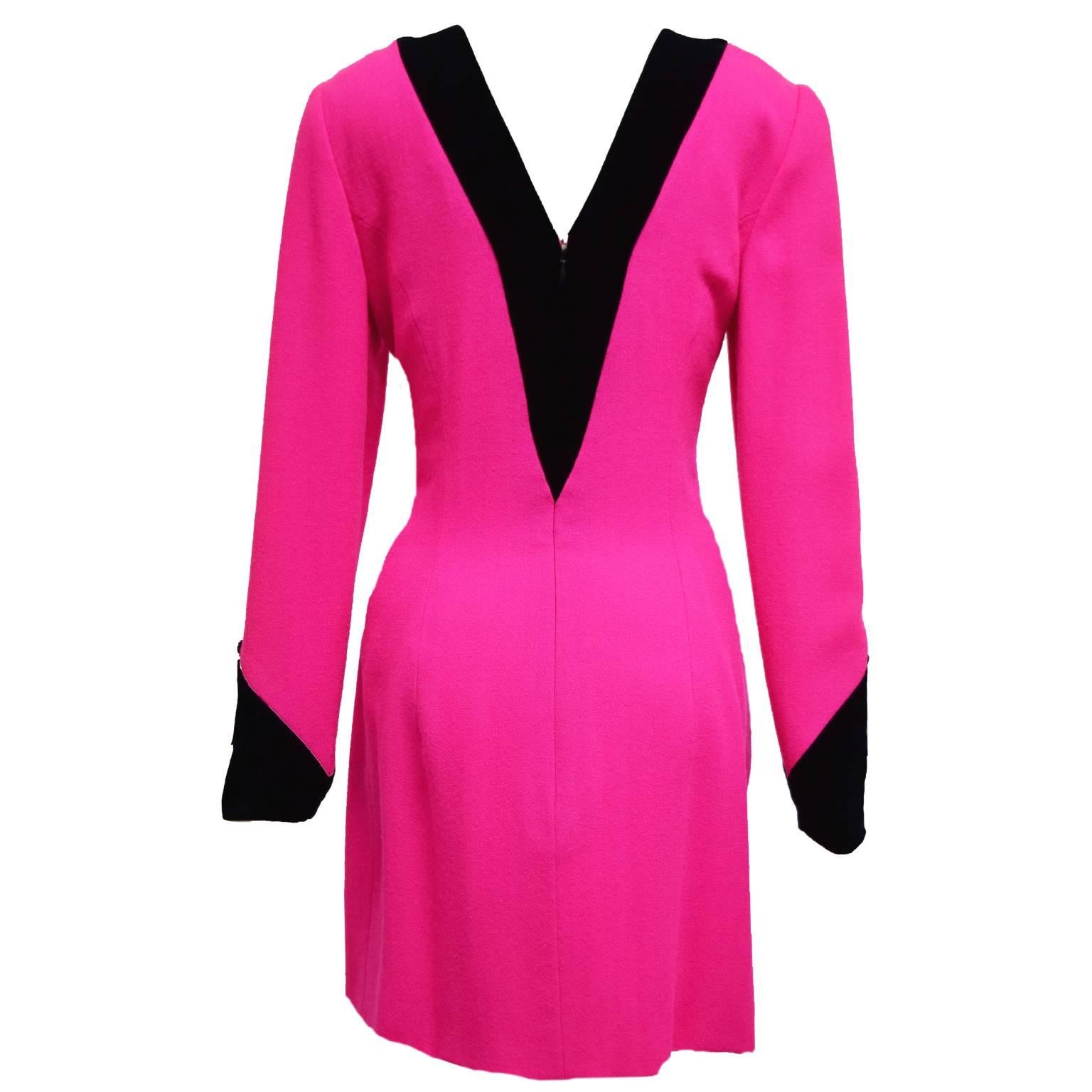 This one of a kind Carolina Herrera is one of her beautiful vintage pieces dated back in the 1980's. This dress can be worn as a cocktail dress, not only that, but it is a unique timeless dress. It is black and neon fuchsia with a deep V back and