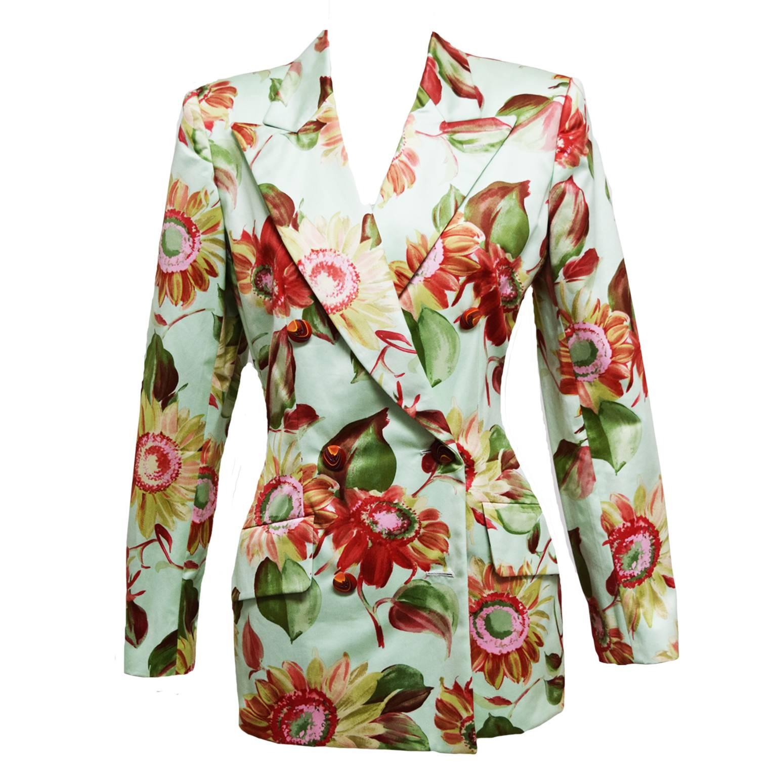 This beautiful piece is an abstract floral print blazer and lined with 100% silk and marbled button closure. 