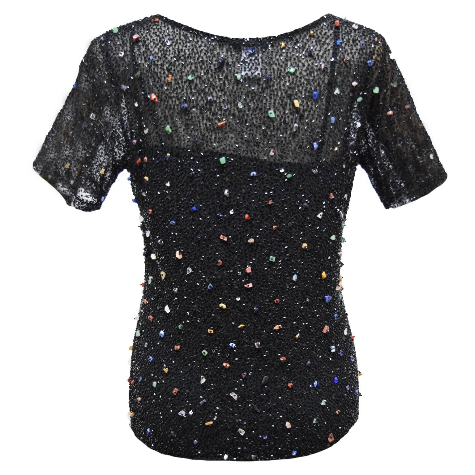 This Krizia blouse is a sheer silk shell with an overall multicolored glass and seed beading design.