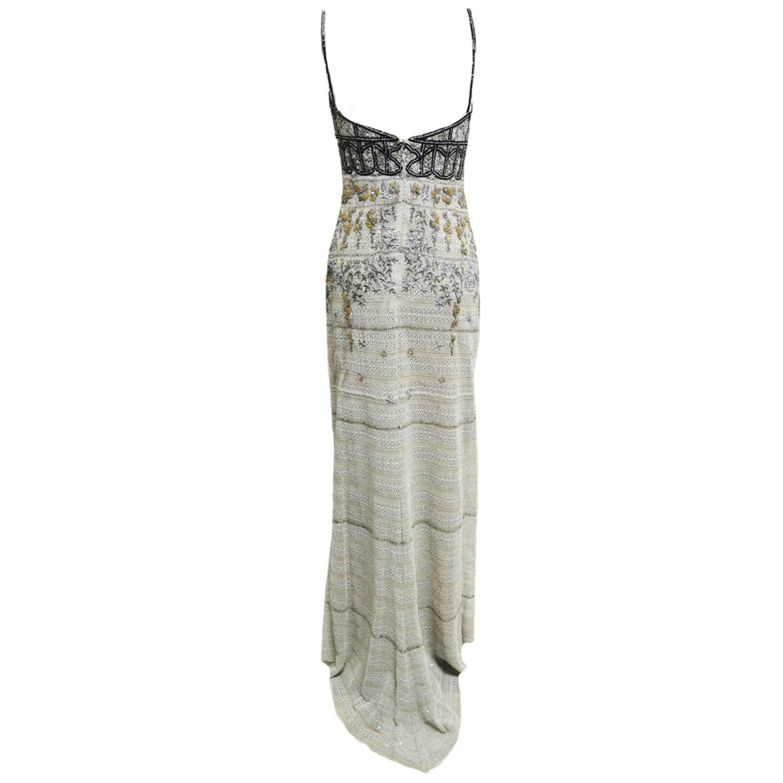 Badgley Mischka Evening Gown in Light Taupe with a Hint of Blue Lace with Exquisite Hand Beaded Bodice and Lightly beaded with tiny clear sequins all over and rows of tiny clear beads mixed with Swarovski silver crystals. The lace is layered with