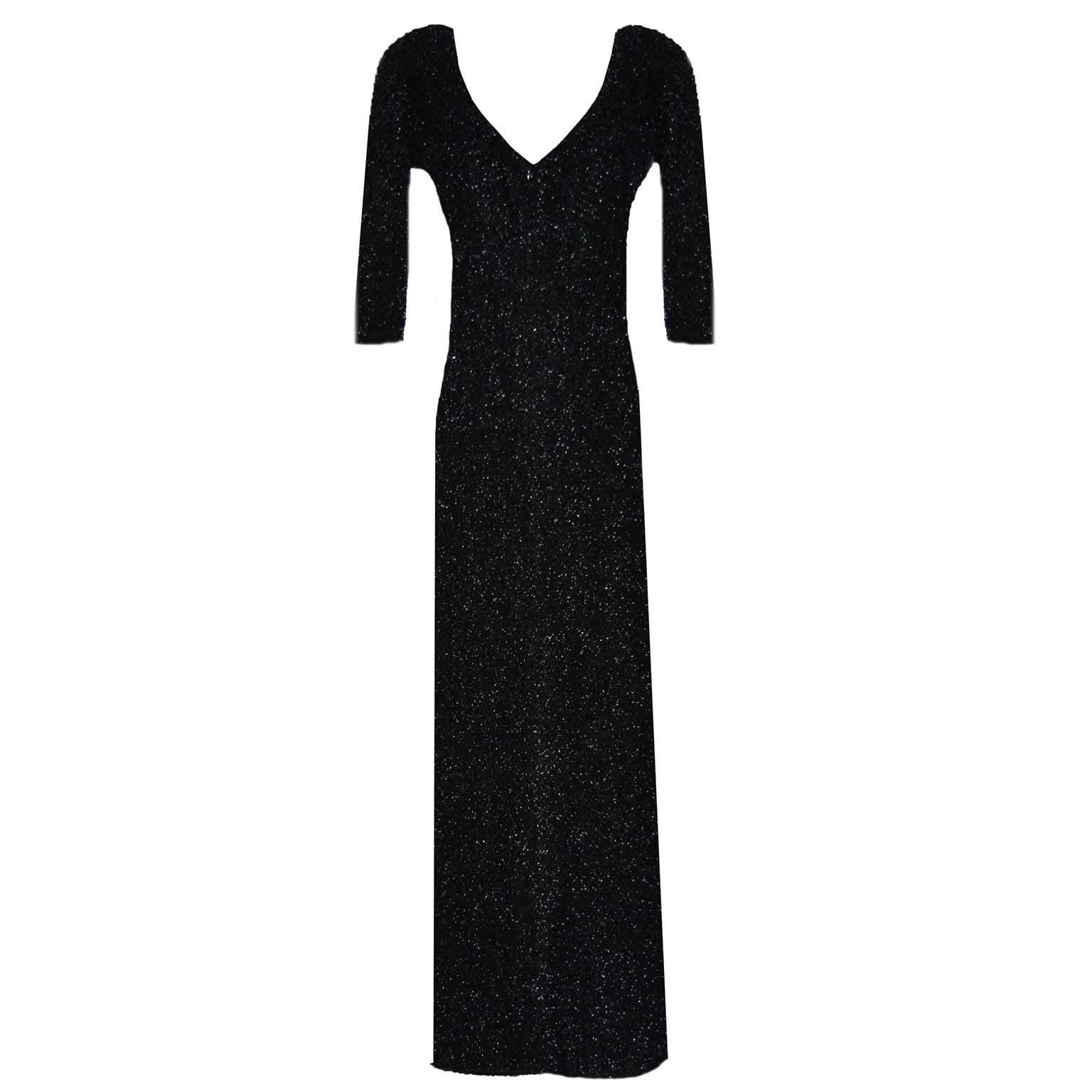 This fabulous Yeohlee Evening Maxi is one of a kind. Made with metallic Tencel gives it a lustrous hand and far away perception. The dress is long sleeved and maxi length, with a zipped back for a slimming elongated look. This Evening dress can be