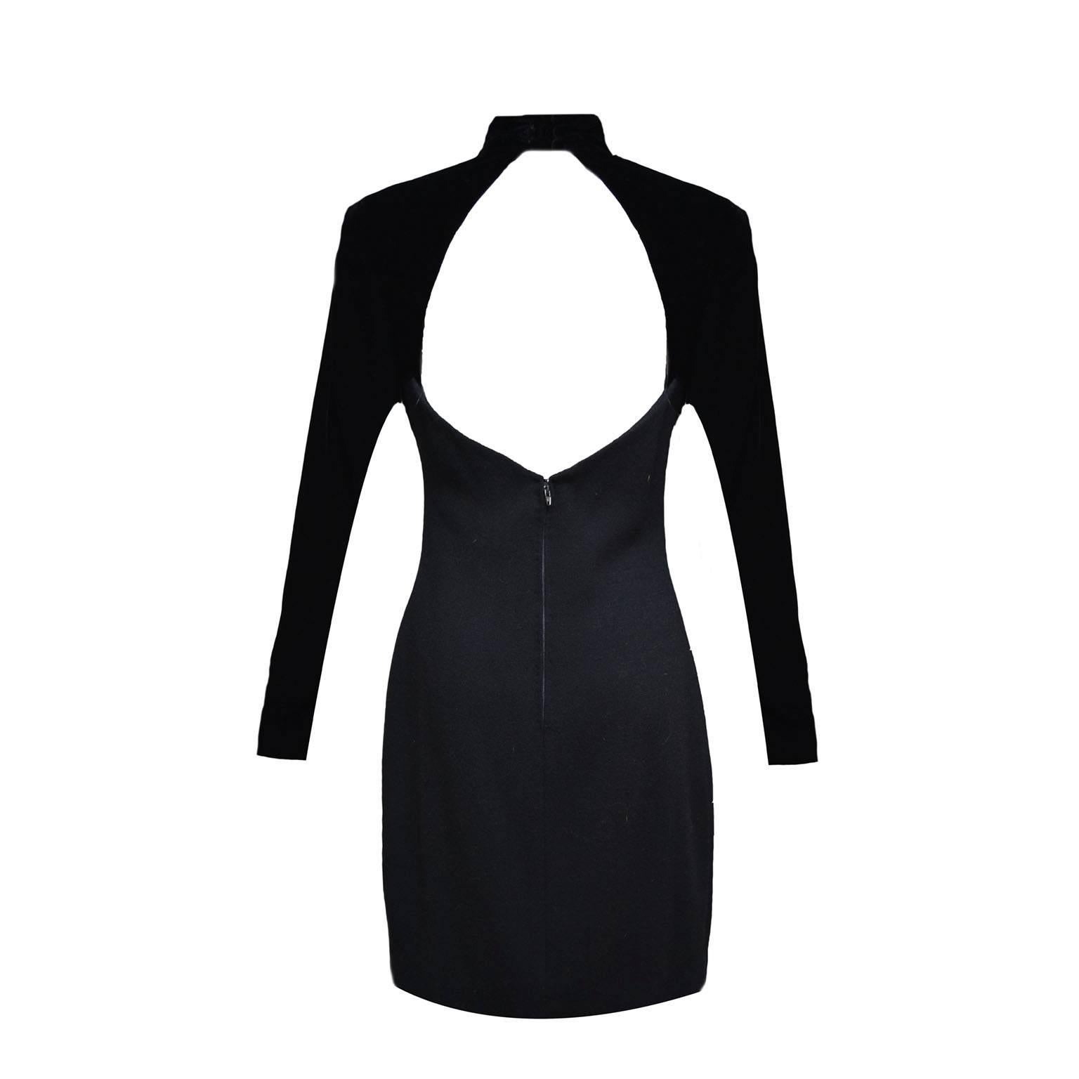 Sophisticated with a touch of sexiness, this dress bodice is made of wool; square neckline features a triangle shaped brooch on each side, long sleeves with a single button closure, mock neck. Easy pull no and off, back zipper with hook and eye and