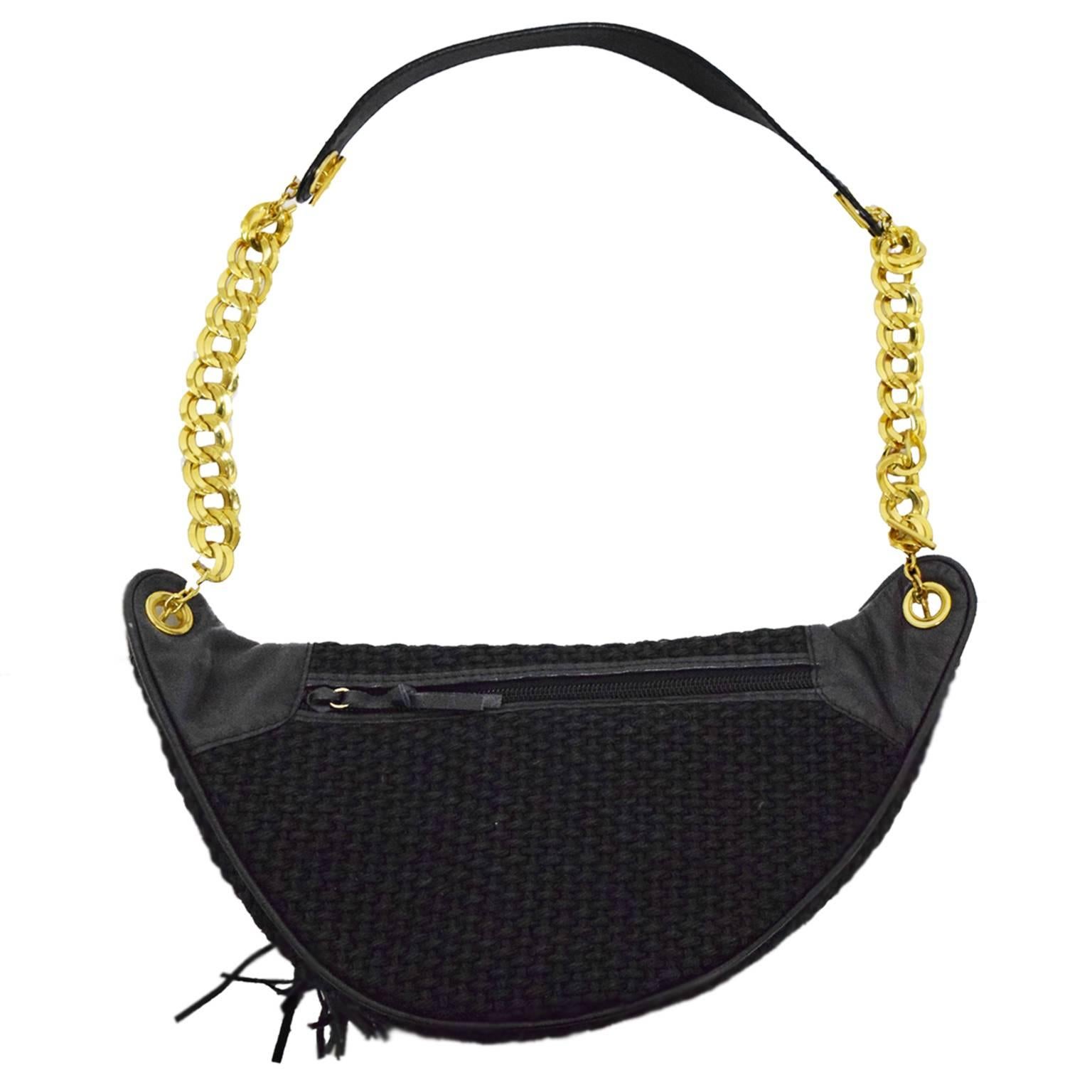 This trendy Bottega piece is on the rise and coming back into style. Made of natural cording textiles, it is woven and fully lined with silk foe a well constructed durable bag. Gold adjustable waist band which can also be used as a shoulder strap