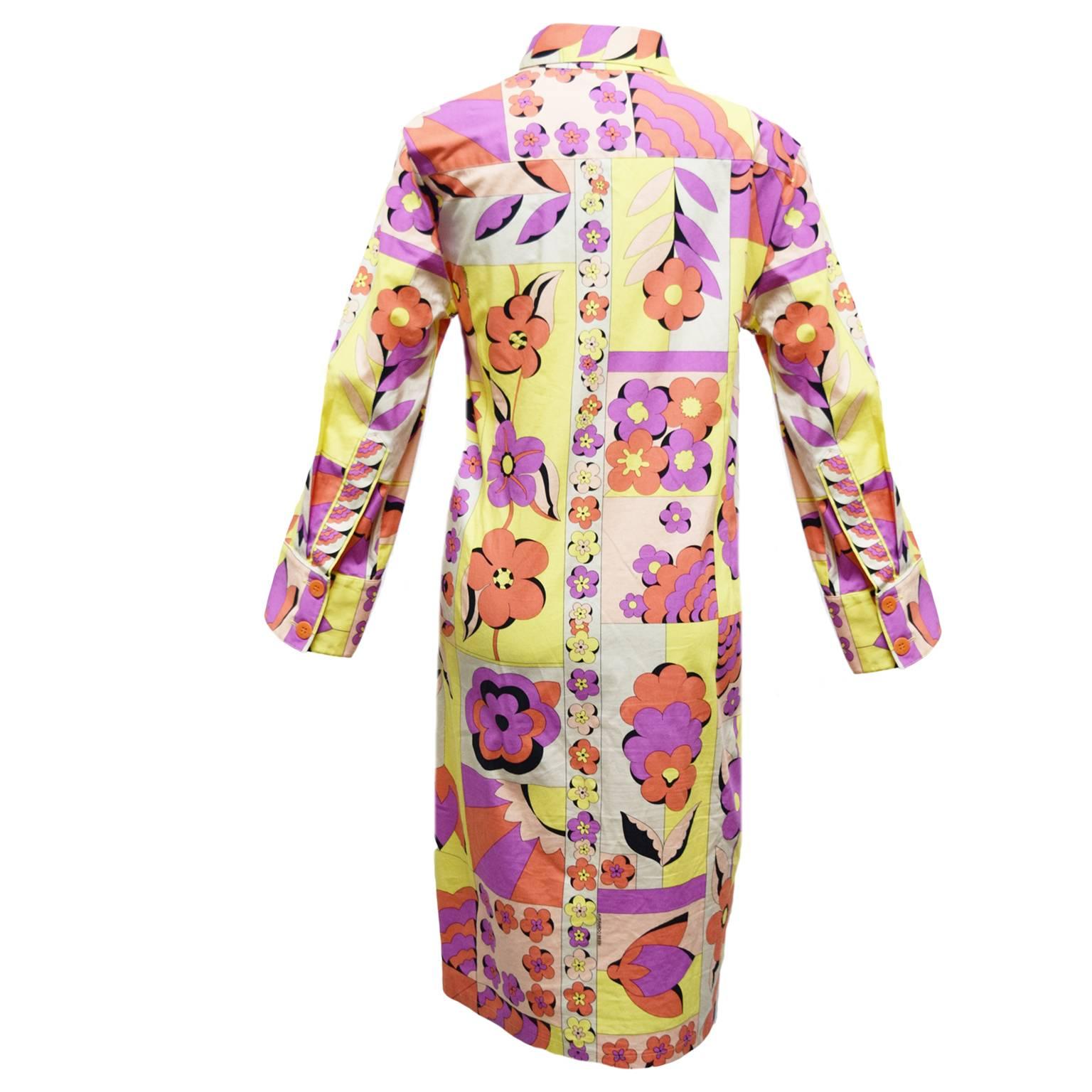 This vintage Averado Bessi shirt dress is made out of 100% cotton and has a printed detachable belt. This designer originally an in house designer for Emilio Pucci, made this inspired print with an array of orange, yellow, Barney, Black and Beige