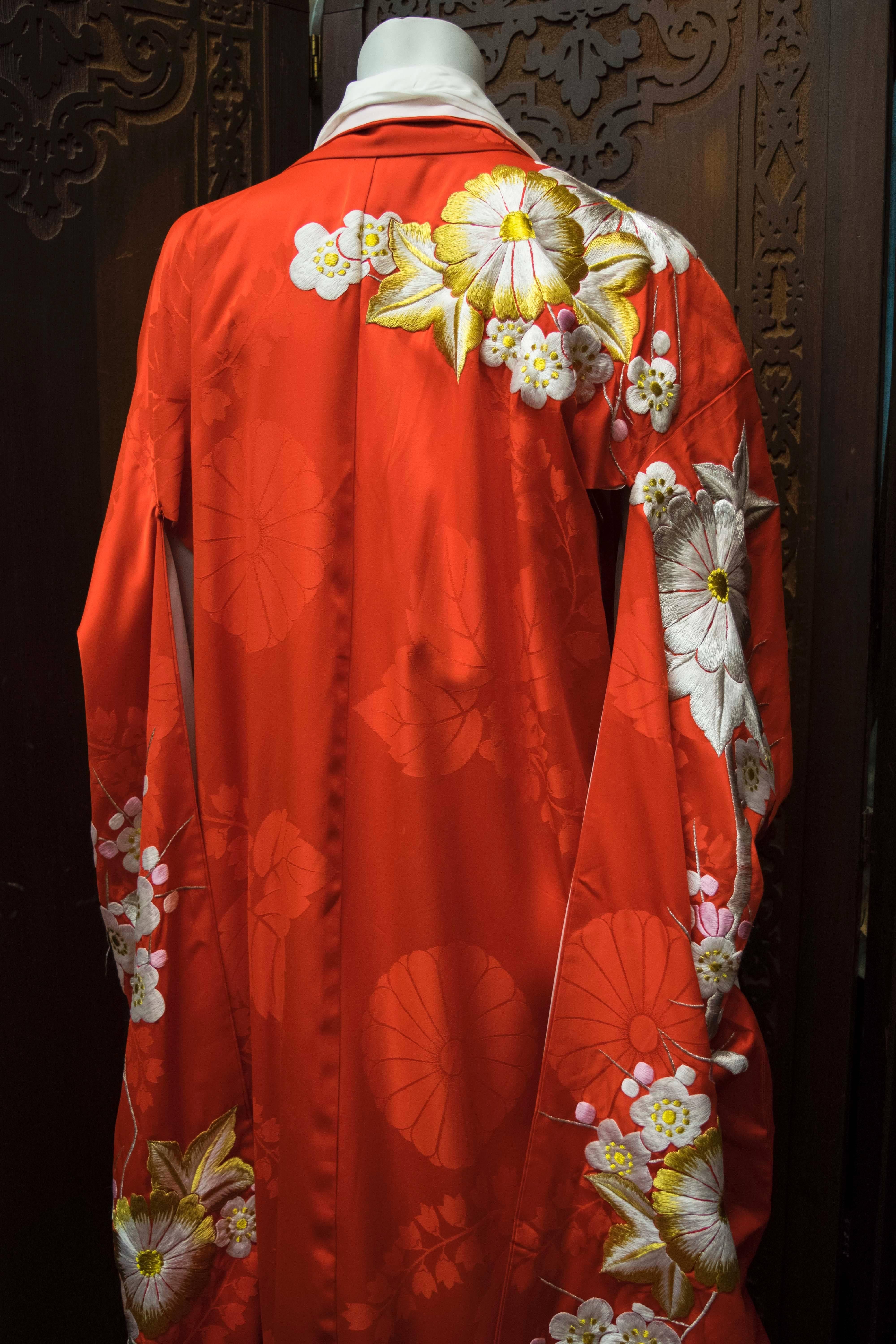 Red Cerimonial Kimono 

Stunning hand embroidered red kimono circa 1960.
