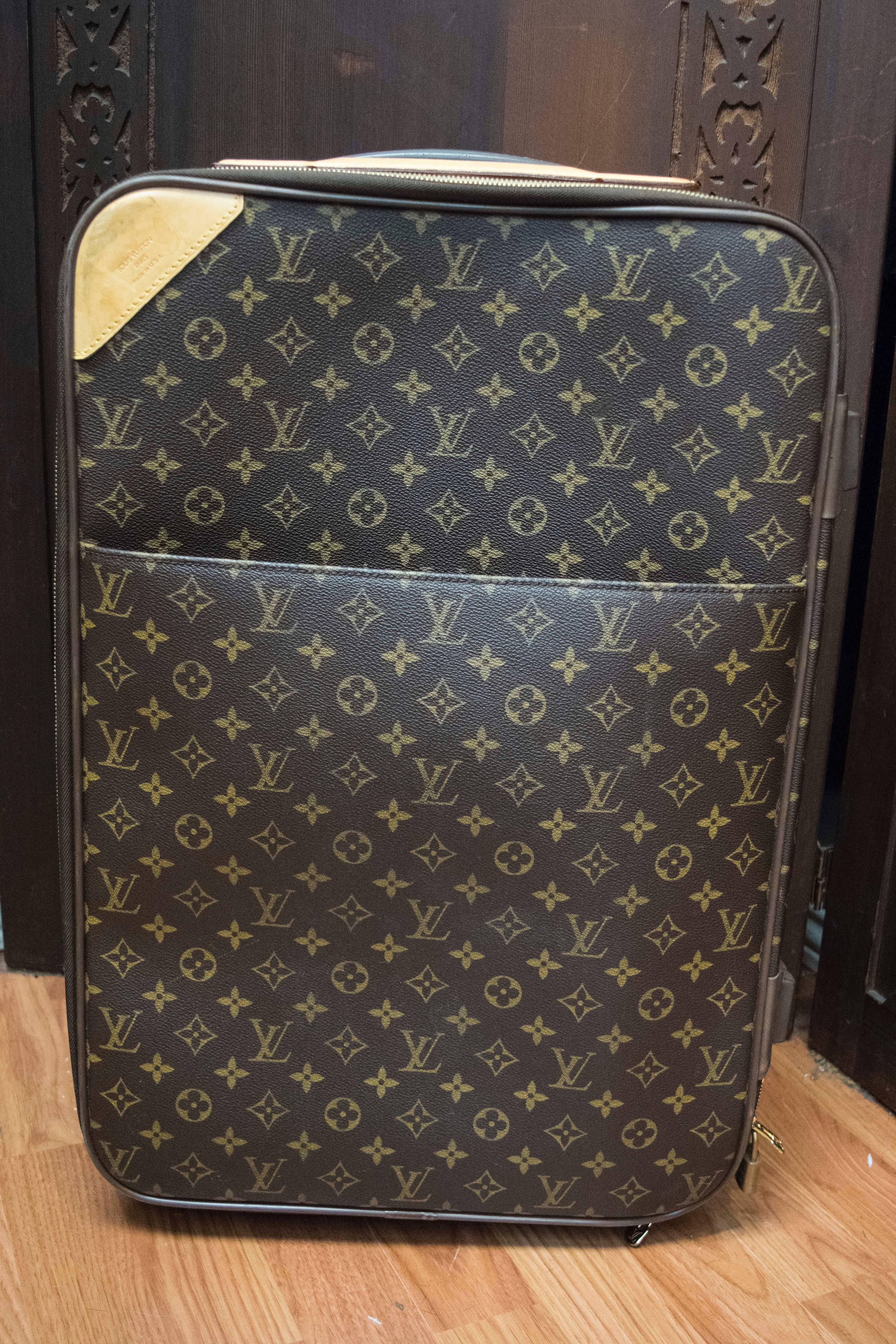 Louis Vuitton Monogram Carry On Suitcase

Travel in style with this chic authentic Louis Vuitton rolling suitcase. The durable and timeless Monogram Canvas exterior is thoughtfully enhanced with smooth rolling wheels and a convenient retractable