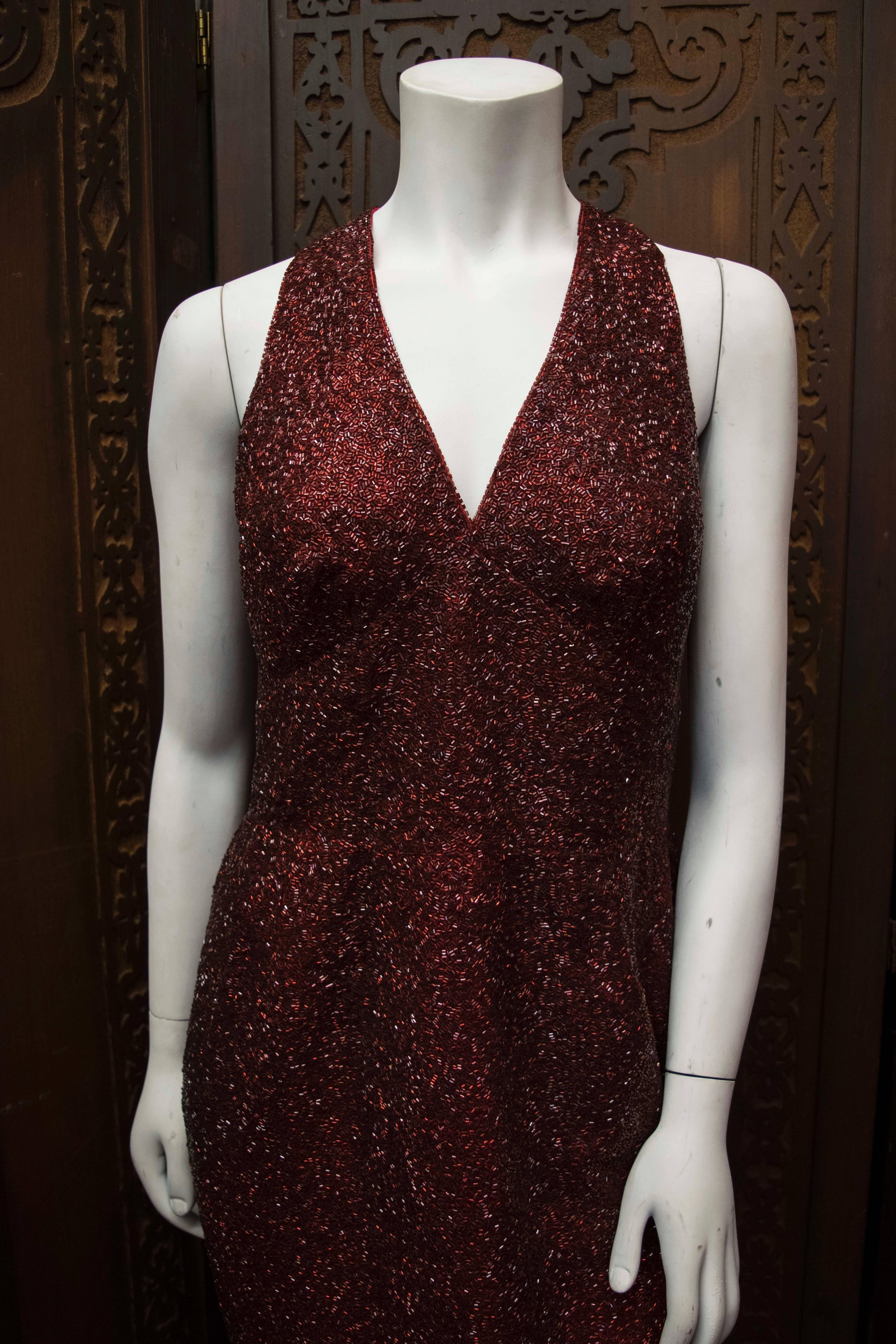 Lillie Rubin Red Beaded Cocktail Dress

Stunning cocktail dress, entirely hand beaded with glass beads. This is a truly show stopping piece. 

B 36
W 30
H 40
L 43