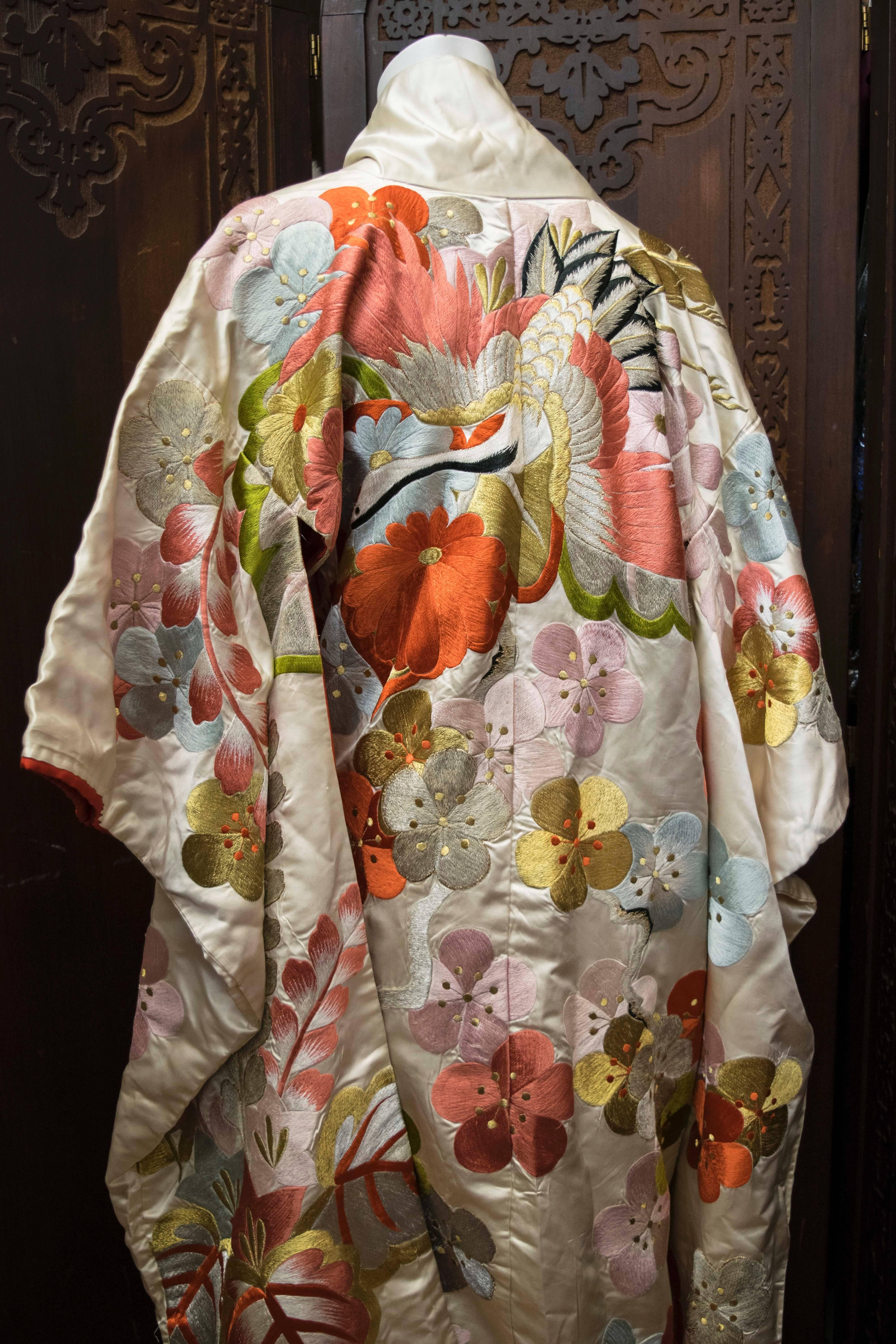 1950s Ceremonial Embroidered Kimono  

Stunning Kimono circa 1950/60, with fabulous embroidery featuring Birds and Flowers in various colours. A wonderful piece of wearable art.