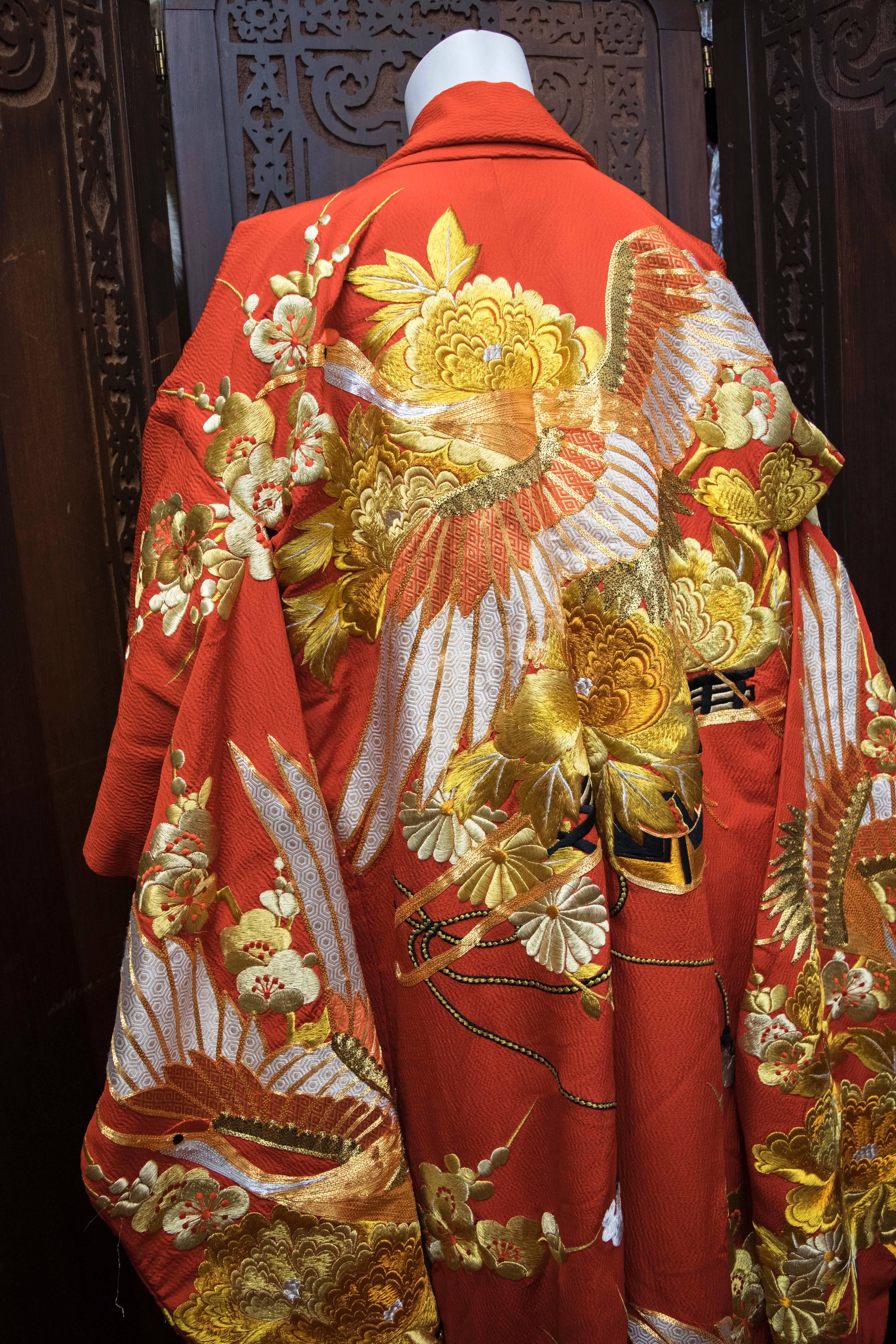 Red and Gold Ceremonial Kimono

The stunning gold embroidery of birds and flowers is beautifully done all over this red kimono. 