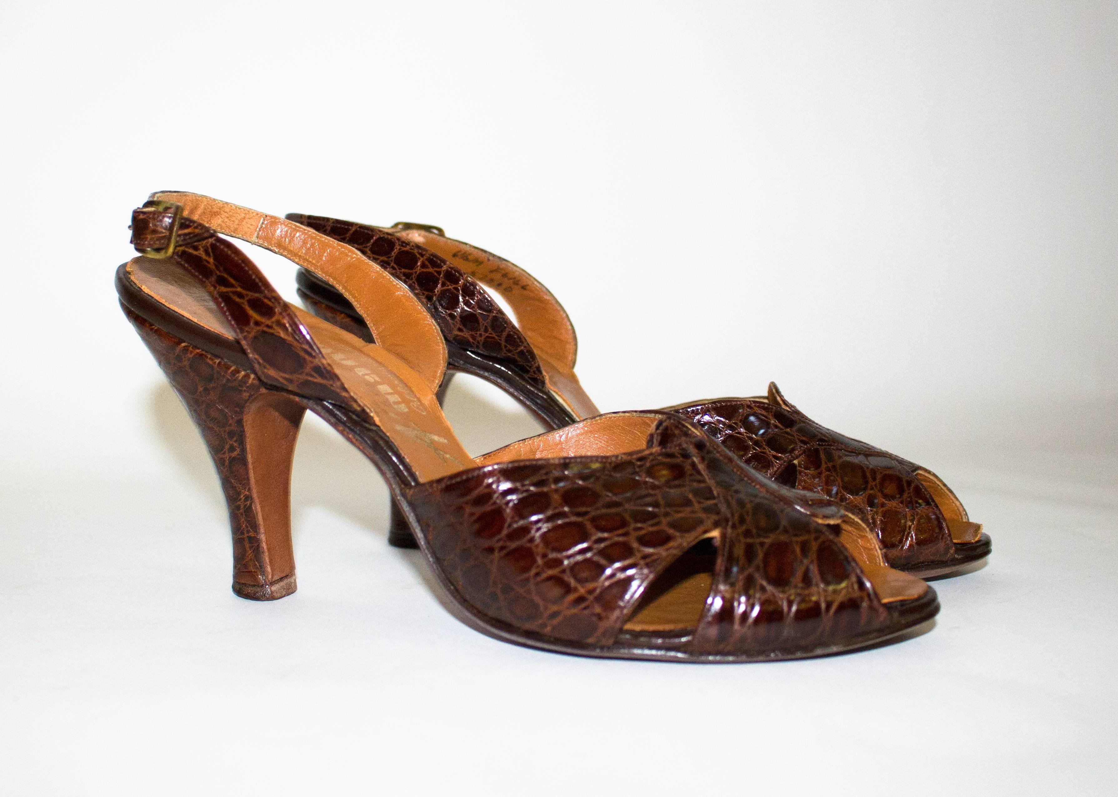 1950s alligator slingback peeptoe heels. Leather sole. 

Palm of foot: 3"
Heel height: 3 1/2"
Insole: 9 3/4"
