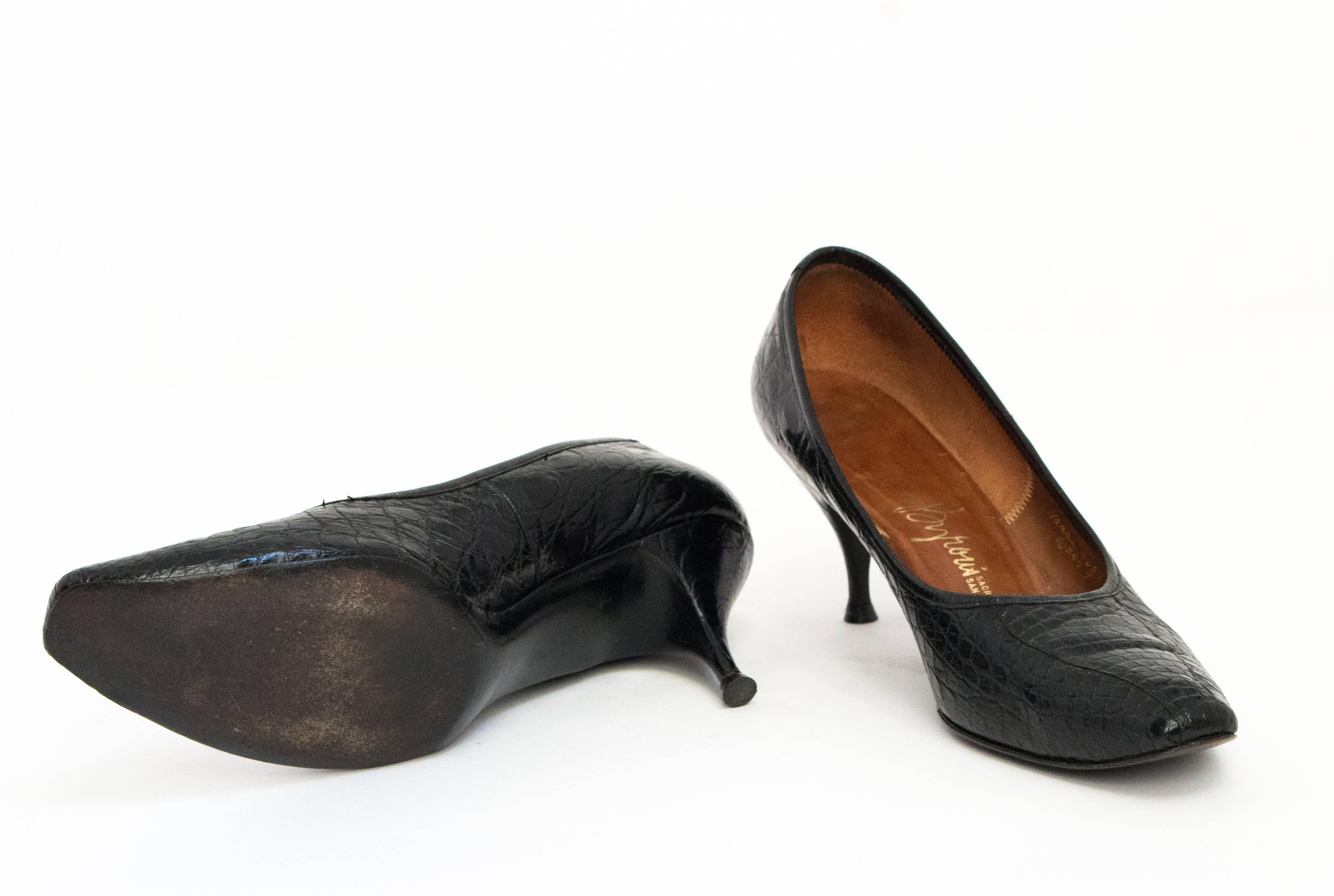 60s black alligator kitten heels. Slightly squared toe. Leather soles. 