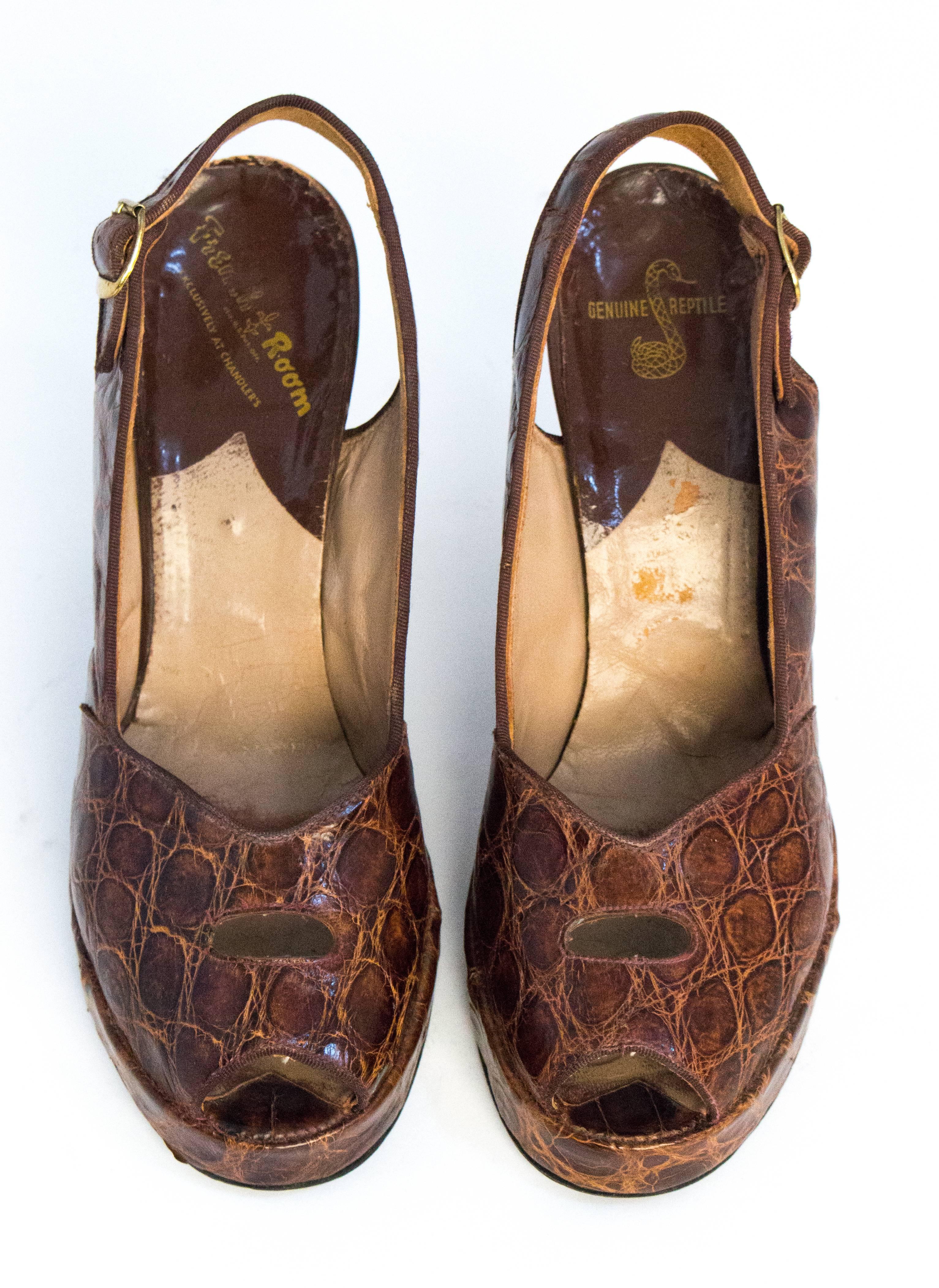 40s peep toe slingback platforms. Cutout on top line of toe box. Leather soles. 

Measurements 

Insole: 9 1/4