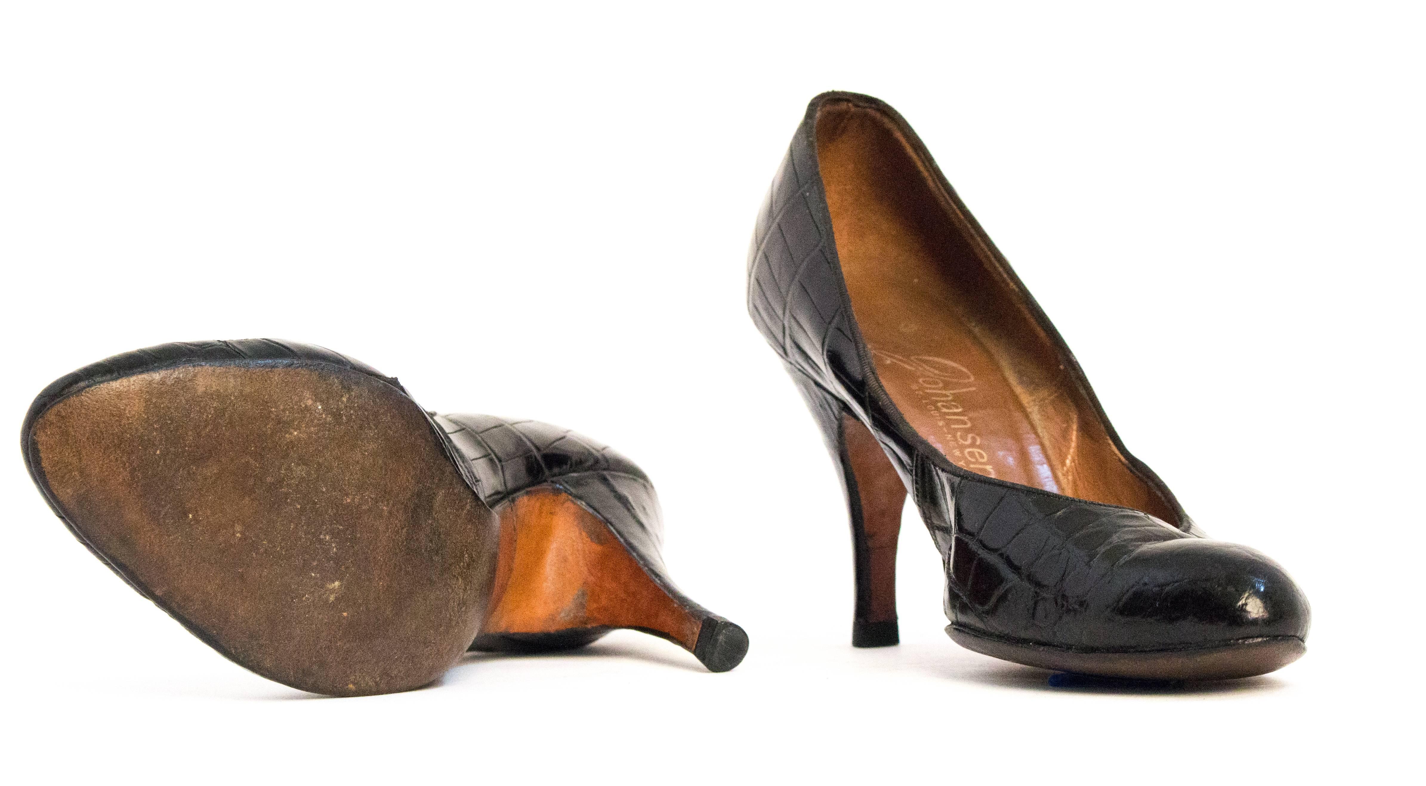 50s black alligator high heels. Leather soles. Black plastic heel caps. 

Measurements

Insole: 9 1/4