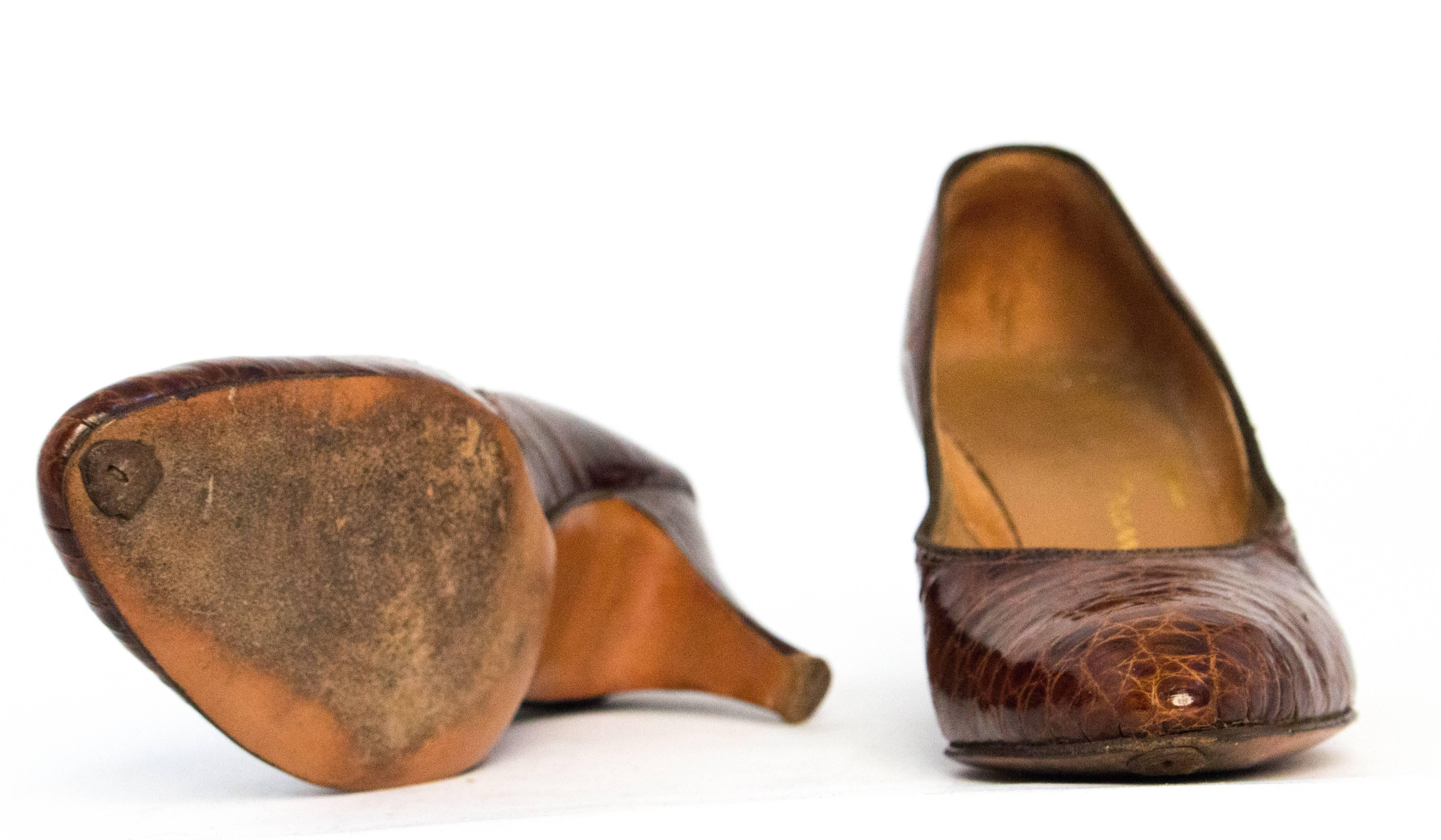 40s brown alligator peep toe heels. Pointed design on toe tops. Leather soles.

Measurements:
Insole: 10 inches 
Palm: 3 1/8 inches 
Heel: 3 inches 

