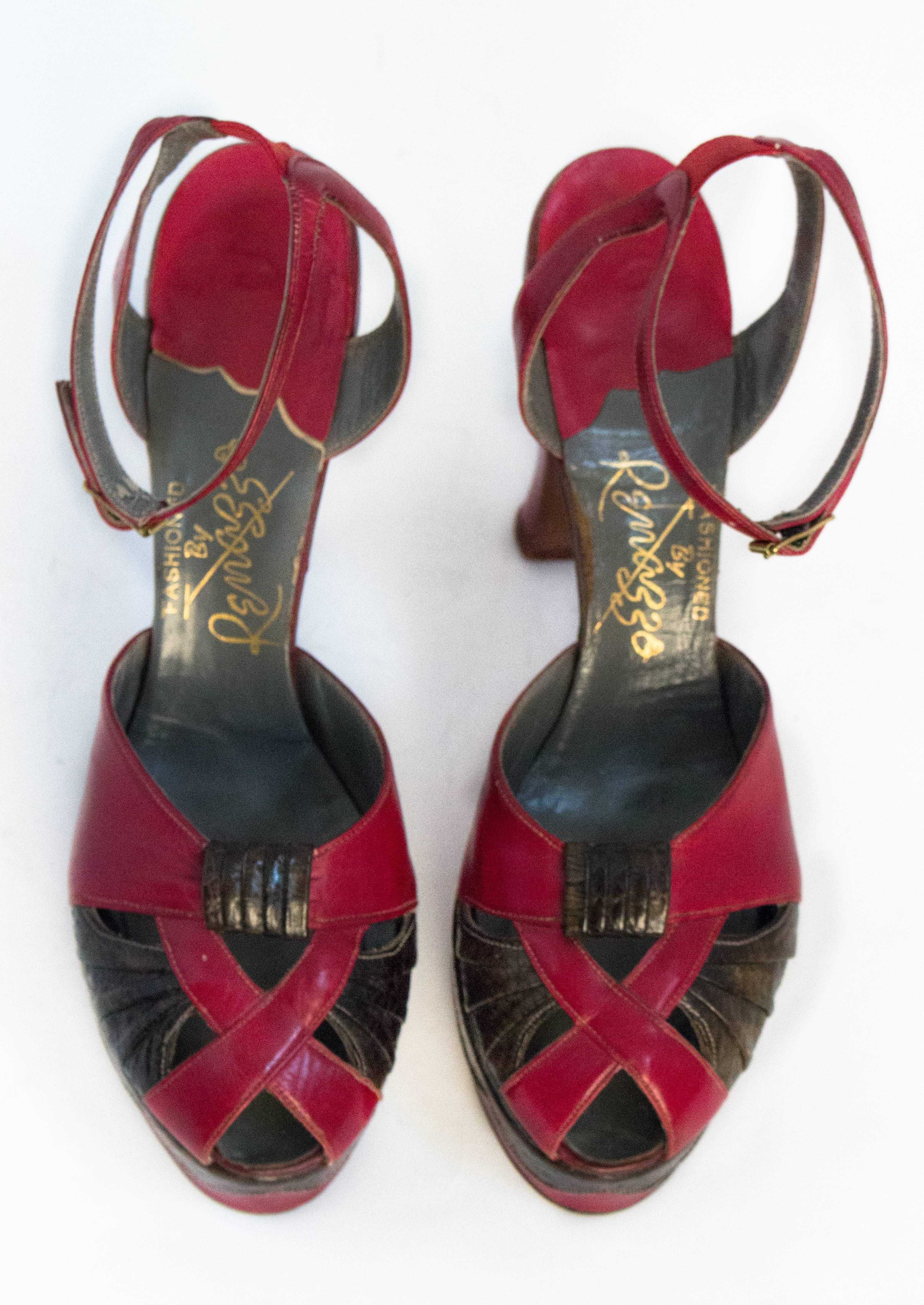 40s red leather and snakeskin platforms with ankle strap. 1 inch of elastic at the back of the heel allows for some give. Leather soles. 

Measurements:
Insole: 9 3/4