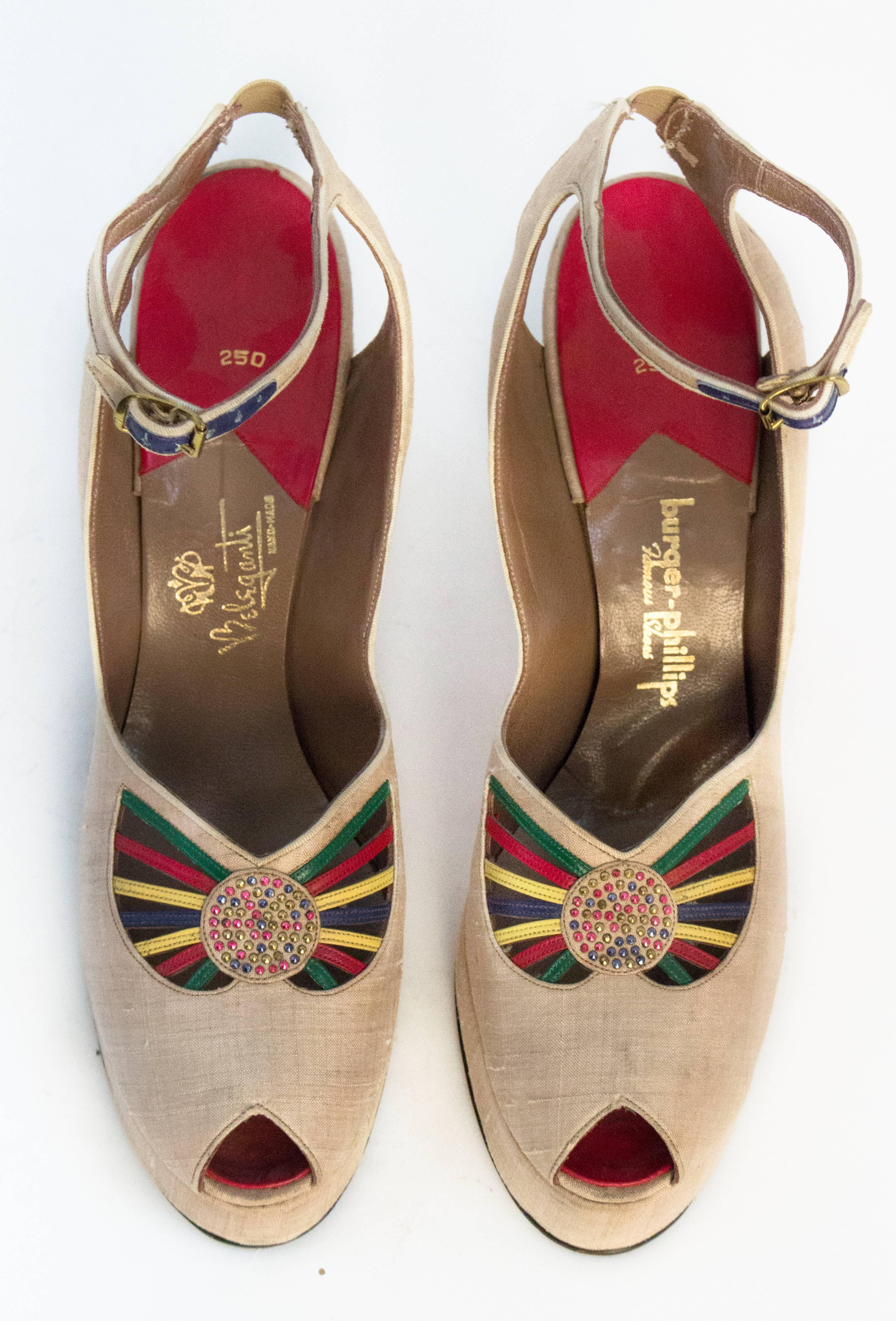 40s silk platform ankle strap heels with colorful leather & studded embellishments. Leather soles. One inch of elastic at the back of the heel allows for some give. 

Measurements:
Insole: 10 1/4"
Palm of the Foot: 2