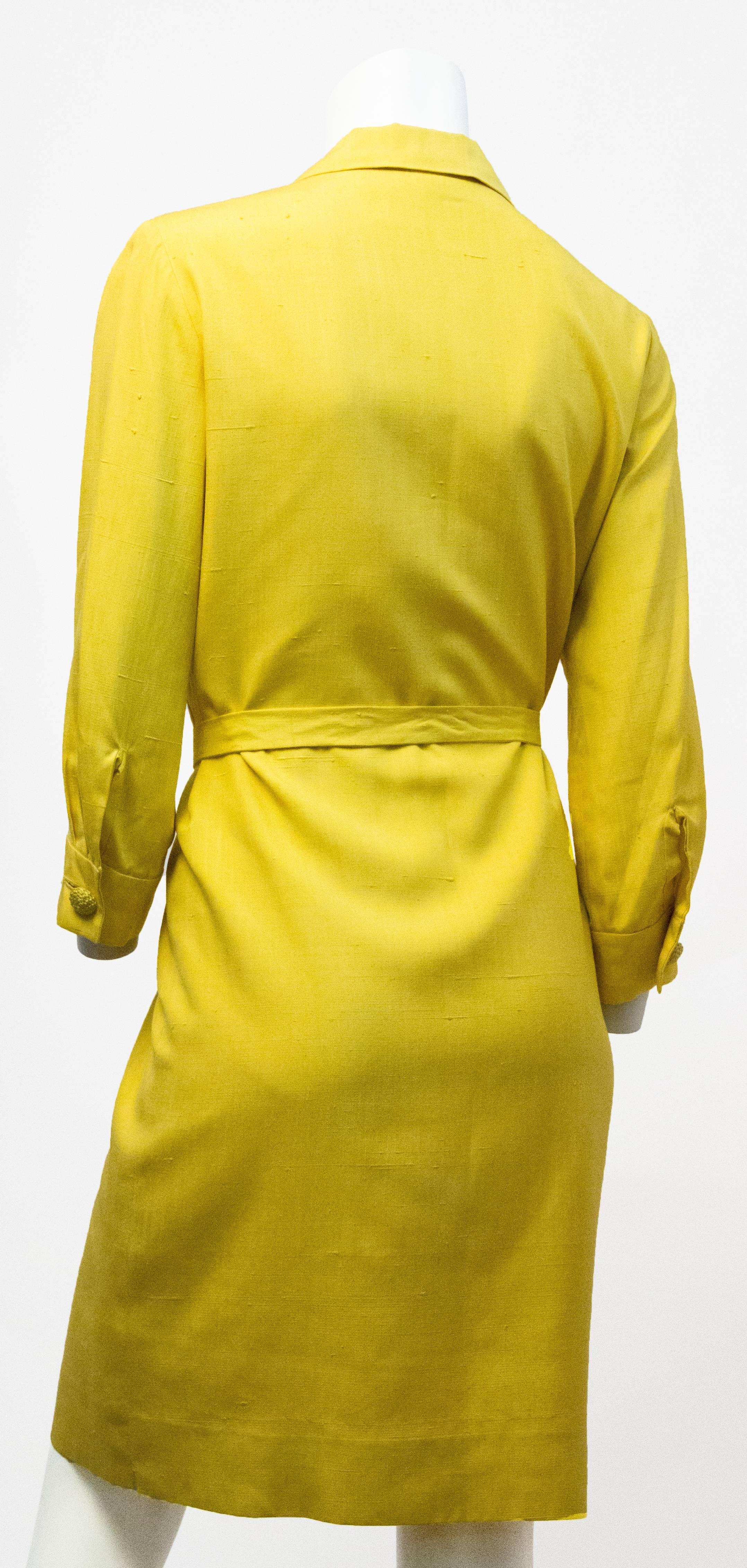 60s mod silk dress. Buttons up the front, and on sleeves. Original waist tie included. Fully lined. 