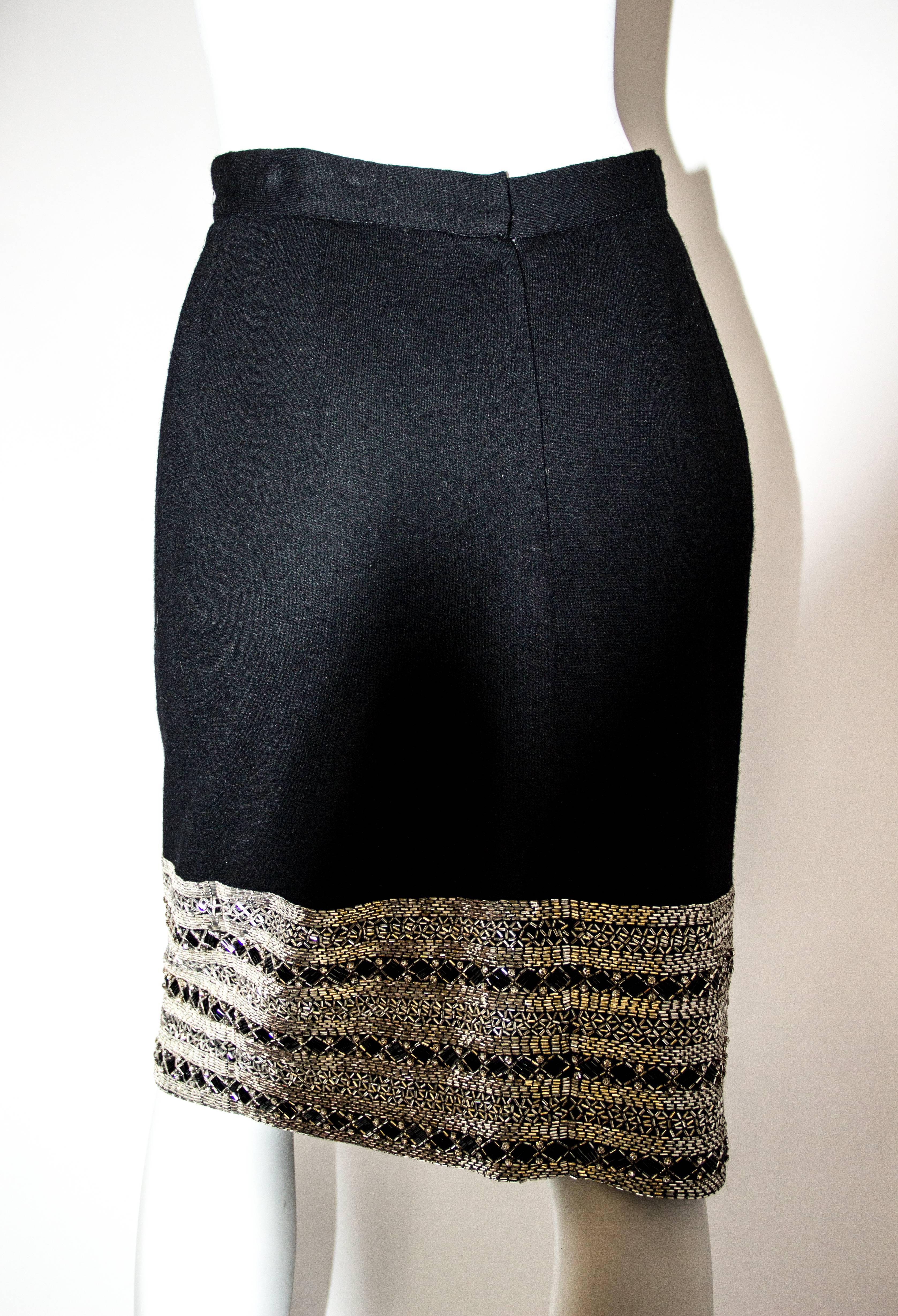 80s C. Randall Brooks Black Wool Pencil Skirt with Silver beaded and Rhinestone Trim. Nylon zipper. Fully lined. 

 