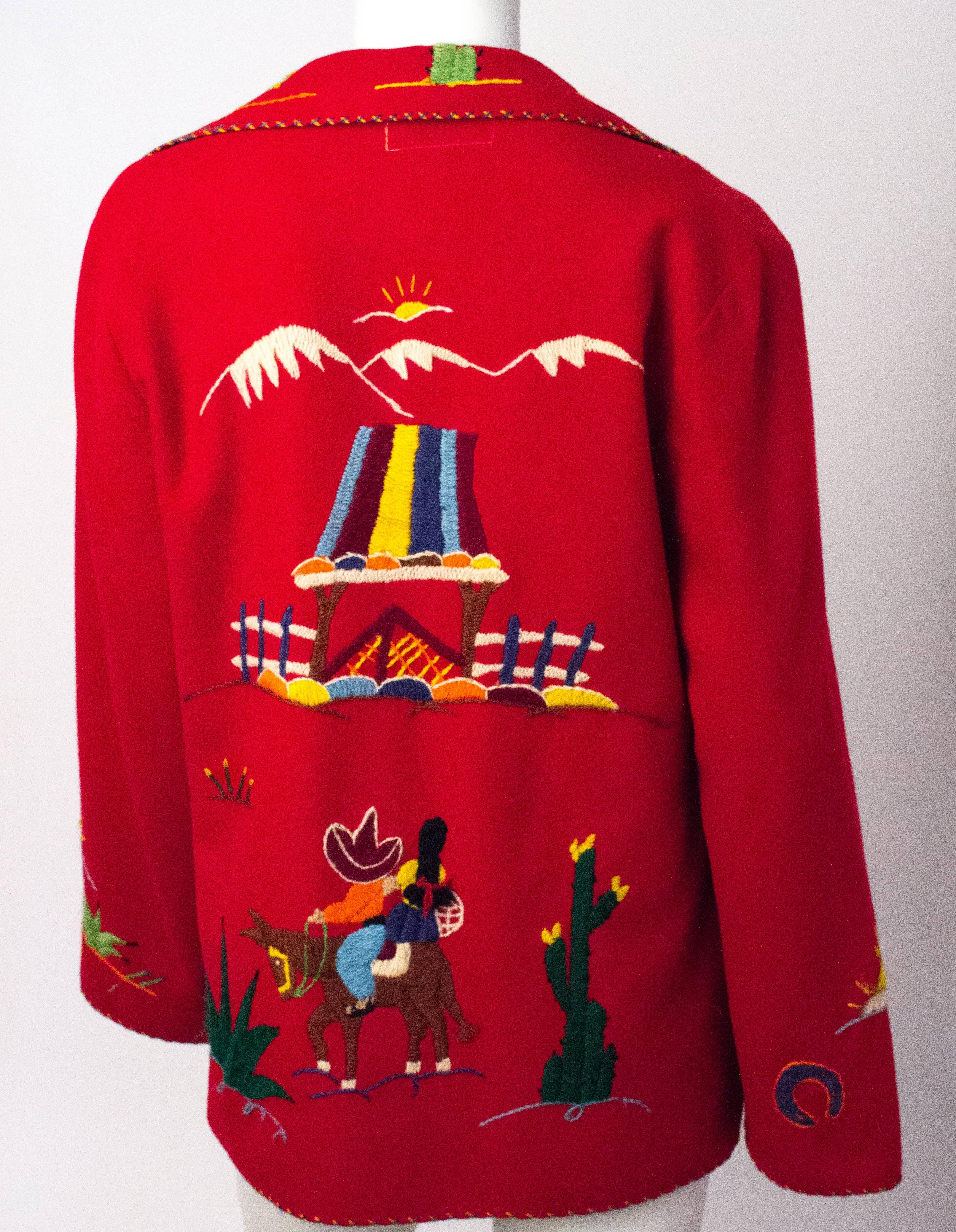 50s red wool embroidered souvenir jacket with scenes of cactus and mountains. 


