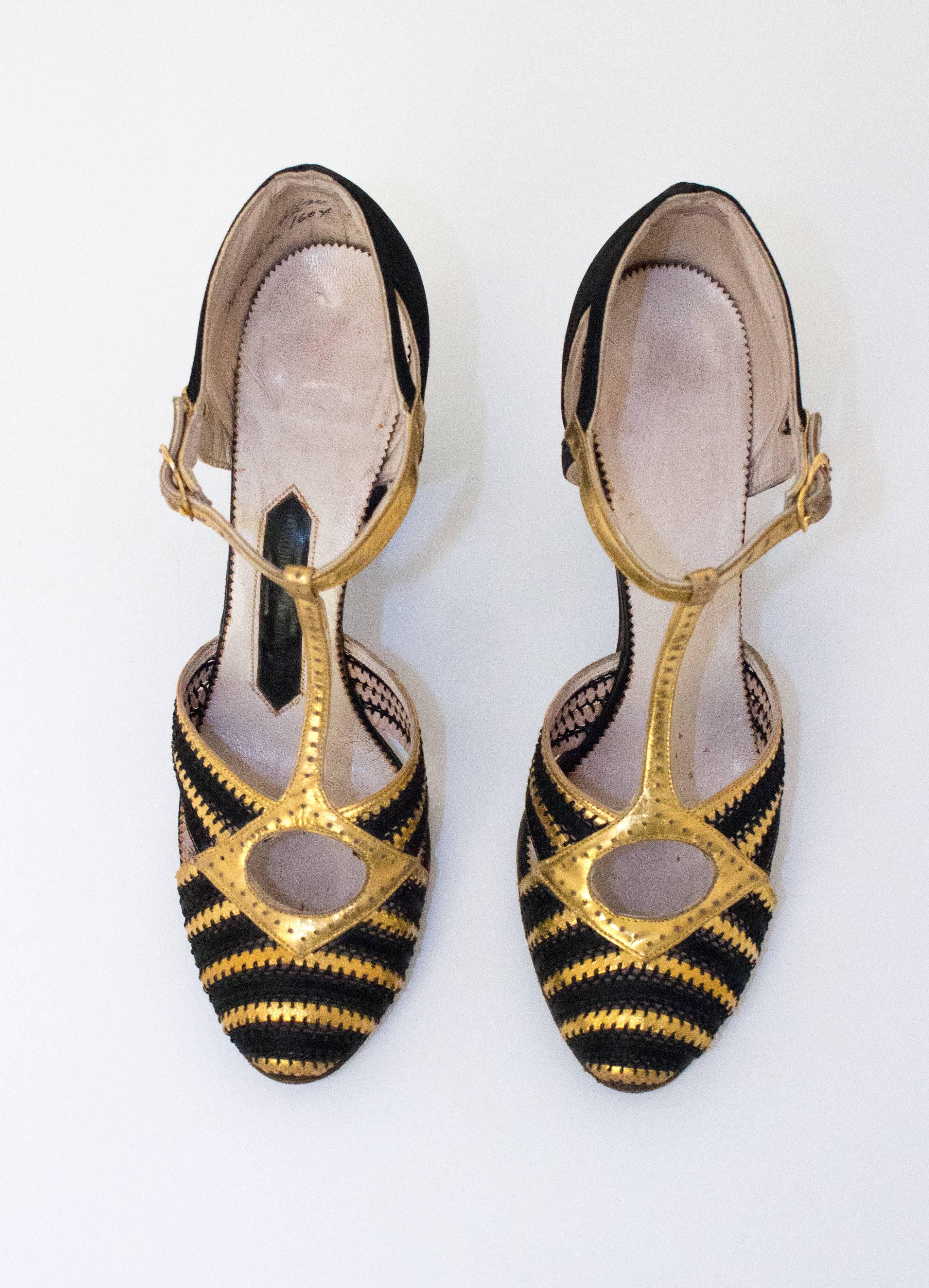 20s Black & Gold Lamé T-Strap Heels. Satin backs and heels. Leather soles. 

Measurements:
Insole: 9 1/2