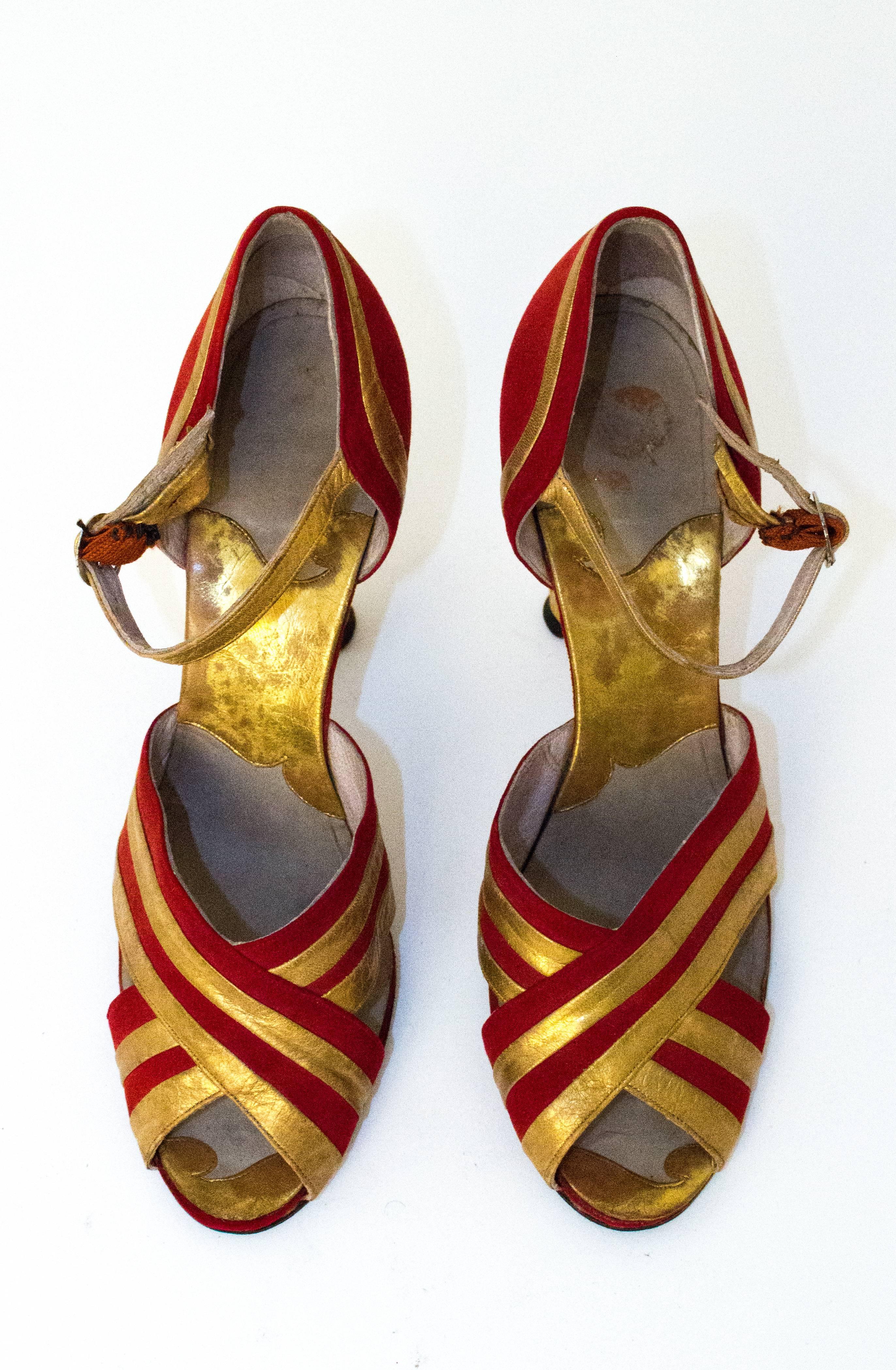 30s Red and Gold Heel. Measures 9 inches from toe to heel.