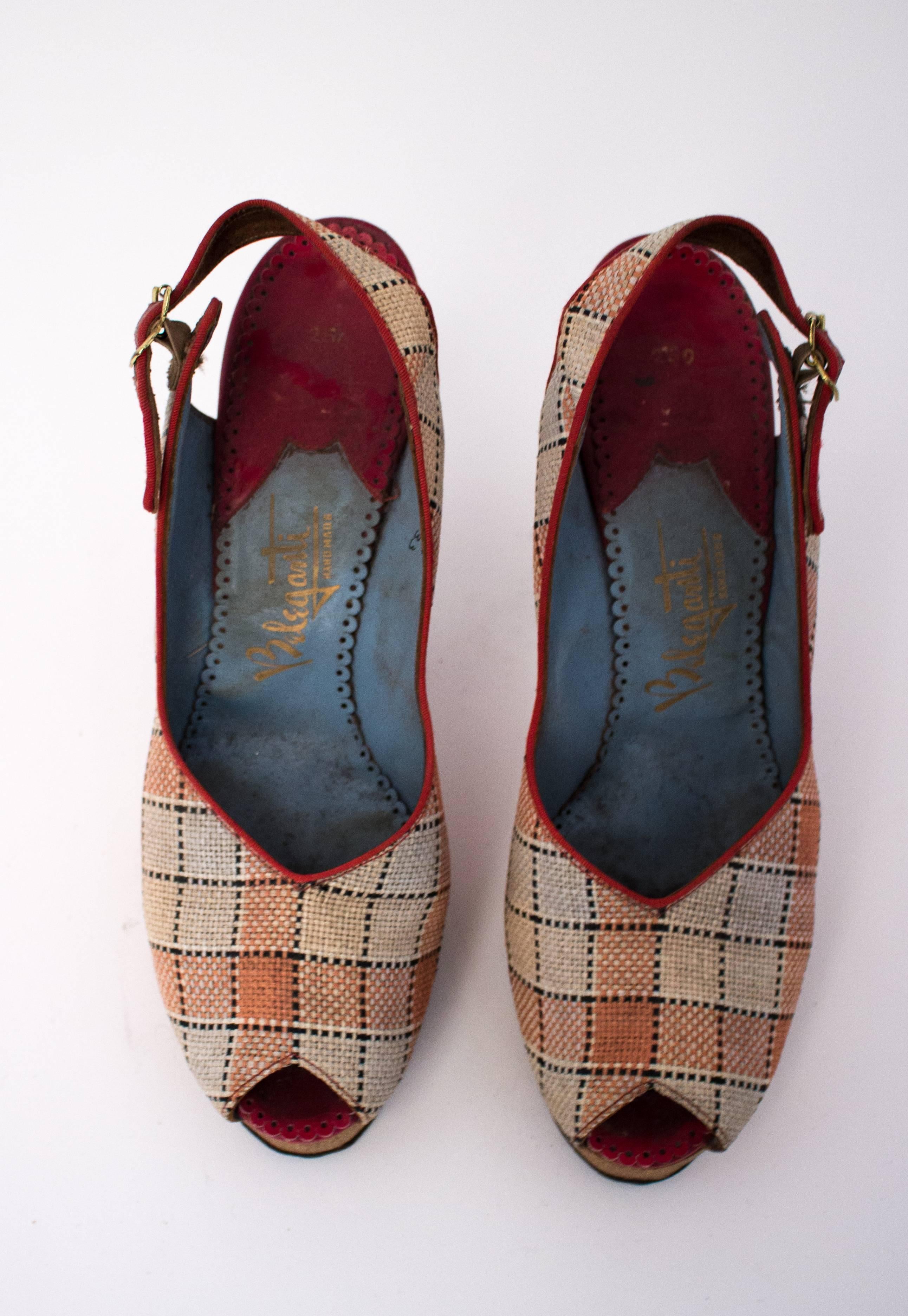 40s Plaid Platform Peep-toe Cork Heels. Heels may have been covered in cork, but it is now removed to reveal an olive green linen type fabric. Leather soles. Metal reinforcements on heels. Gold tone buckles. 

Measurements:
Insole: 9