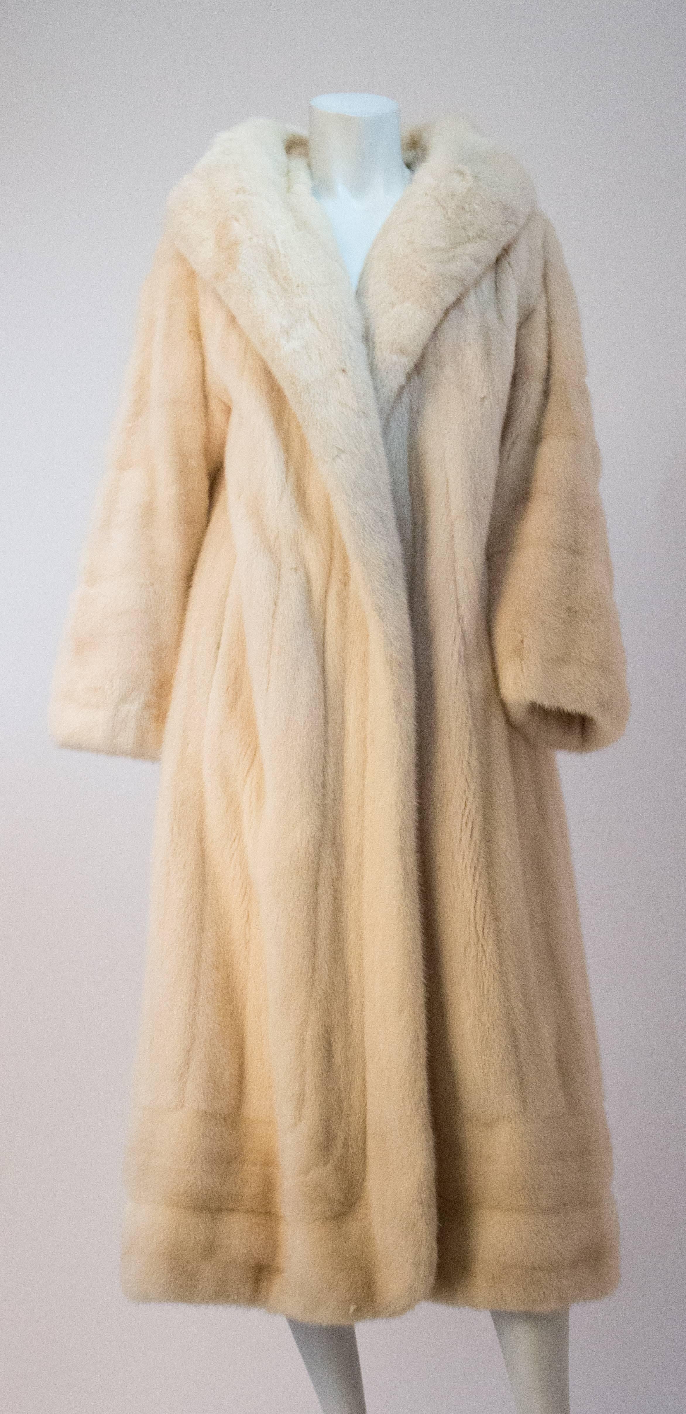 Full Length Cream Mink Fur Coat With Unusual Large Framing Collar. Fully lined. Lining is partially quilted. Invisible side pockets. Interior pocket tag reads 