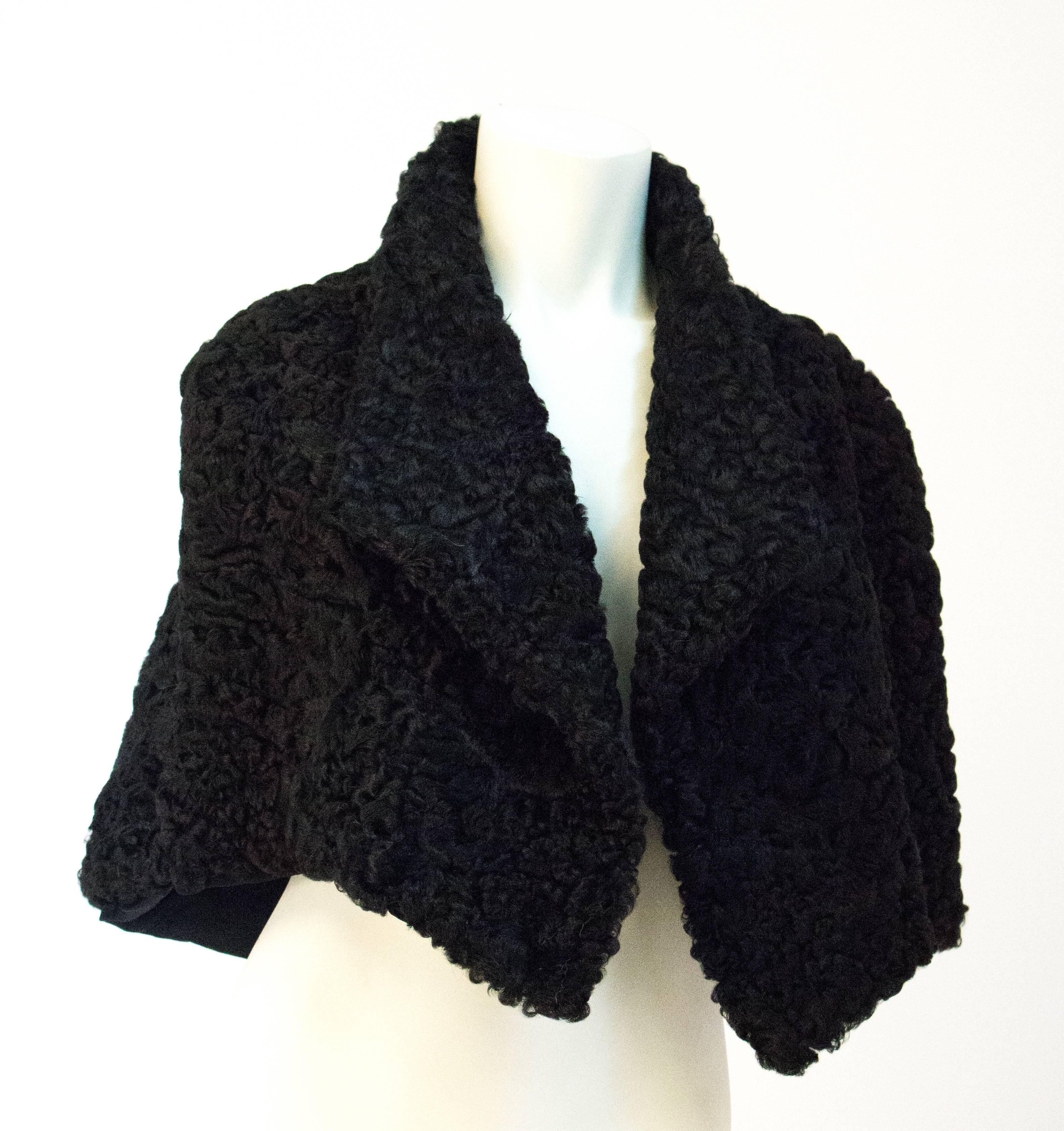 50s Black Persian Lamb Capelet. Interior pocket. Fully lined. 

Approximately a size small (US)