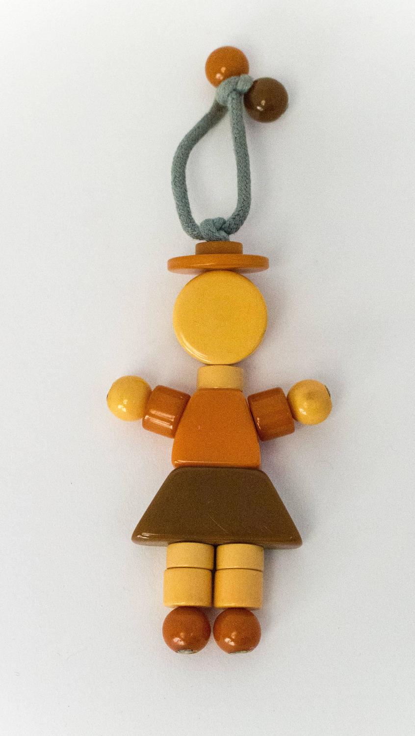 40s Vintage Bakelite Girl Crib Toy For Sale at 1stdibs