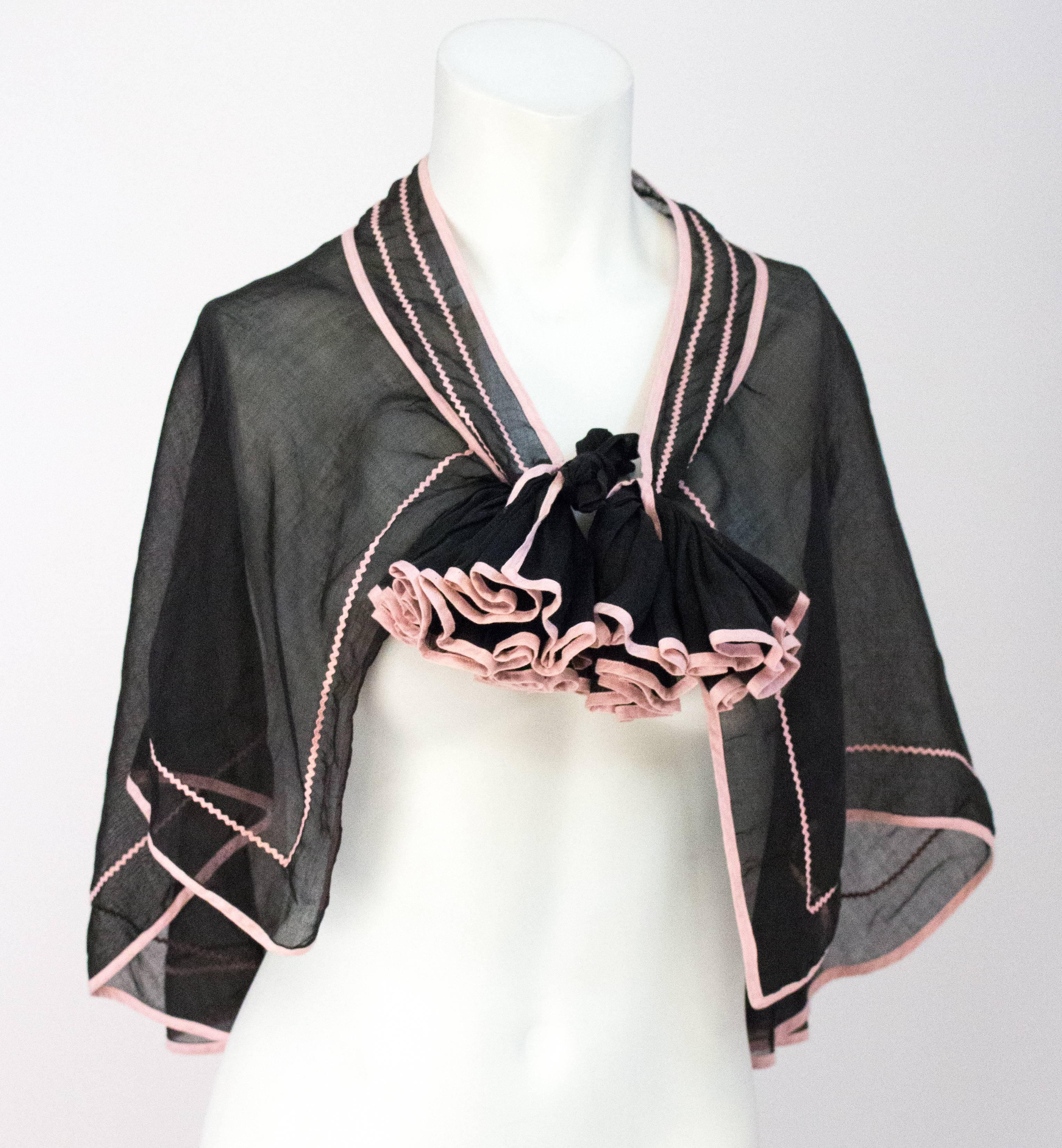 30s Black Silk Voile Capelet with Pink Trim. Ties at the neck. 