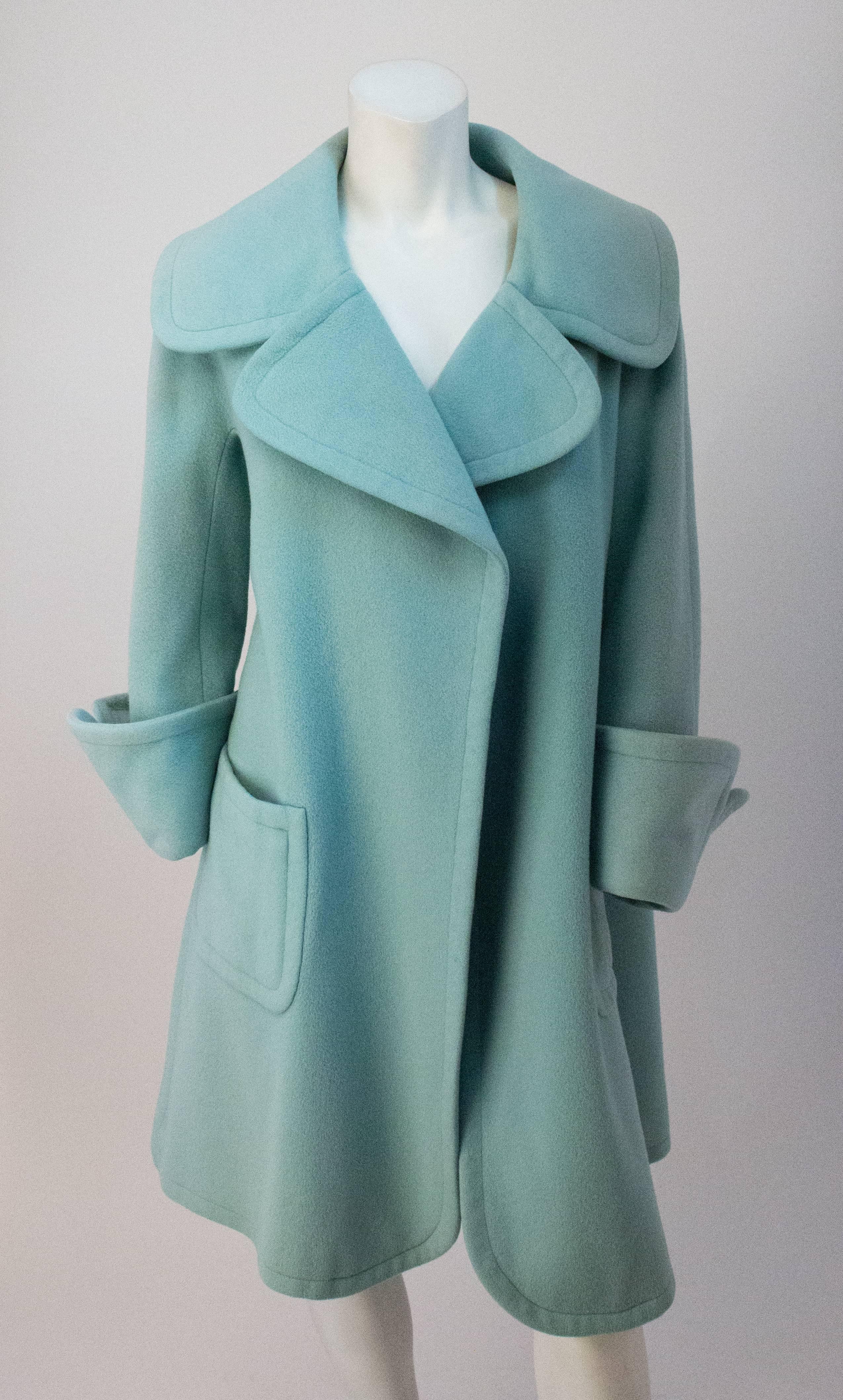 50s Ohrbach's Robbins Egg Blue Swing Coat. Front patch pockets. 3/4 sleeve. Lined. 