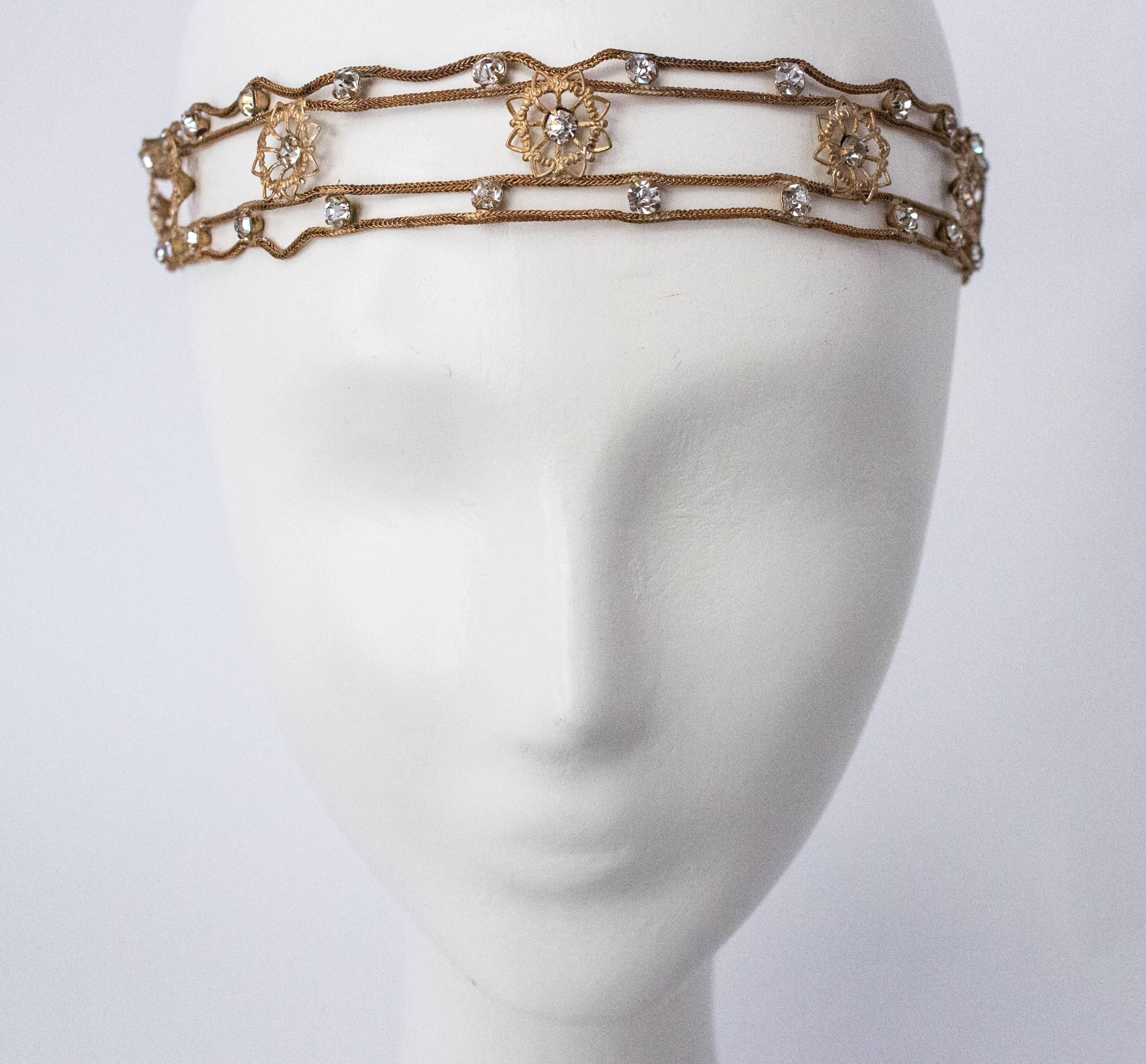 20s headpiece has gold lamé braided ribbon which ties in the back so it is completely adjustable