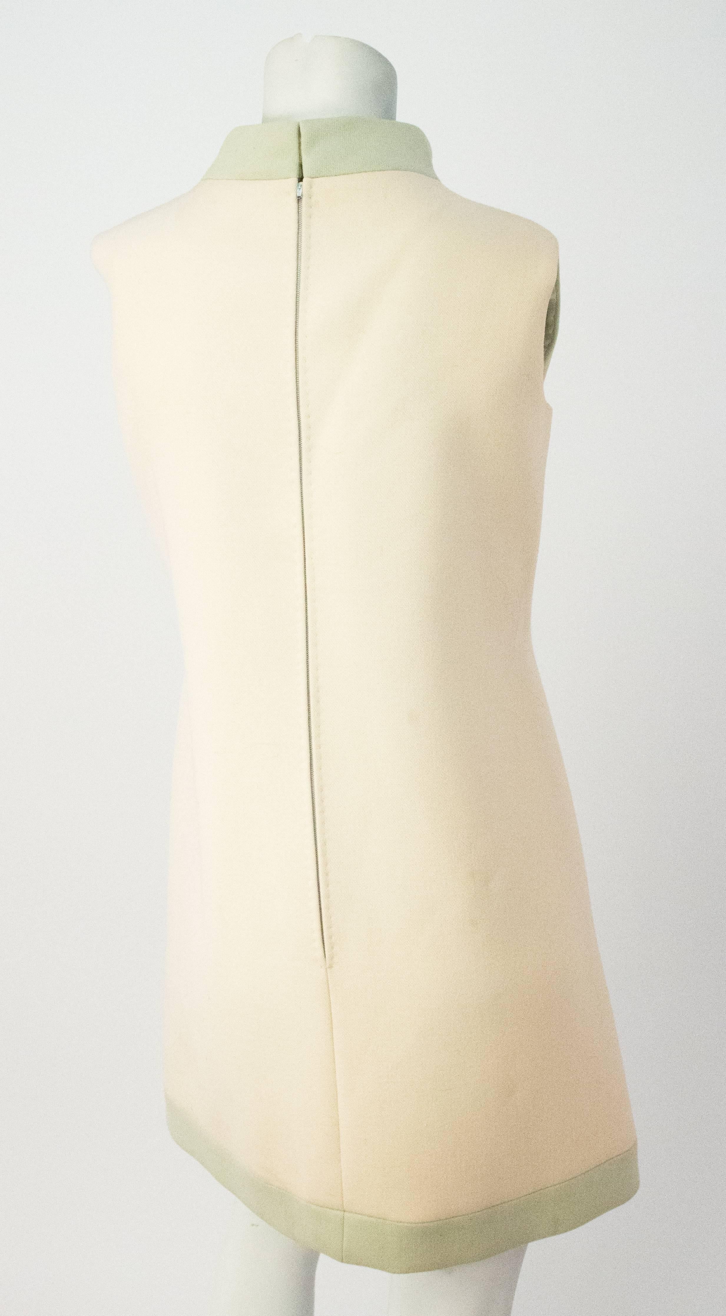 60s Carven Boutique Cream & Mint Mock Turtle Neck Dress. Medium weight wool blend fabric. Fully Lined. Metal zipper up the back with hook and eye closures at the neck.  