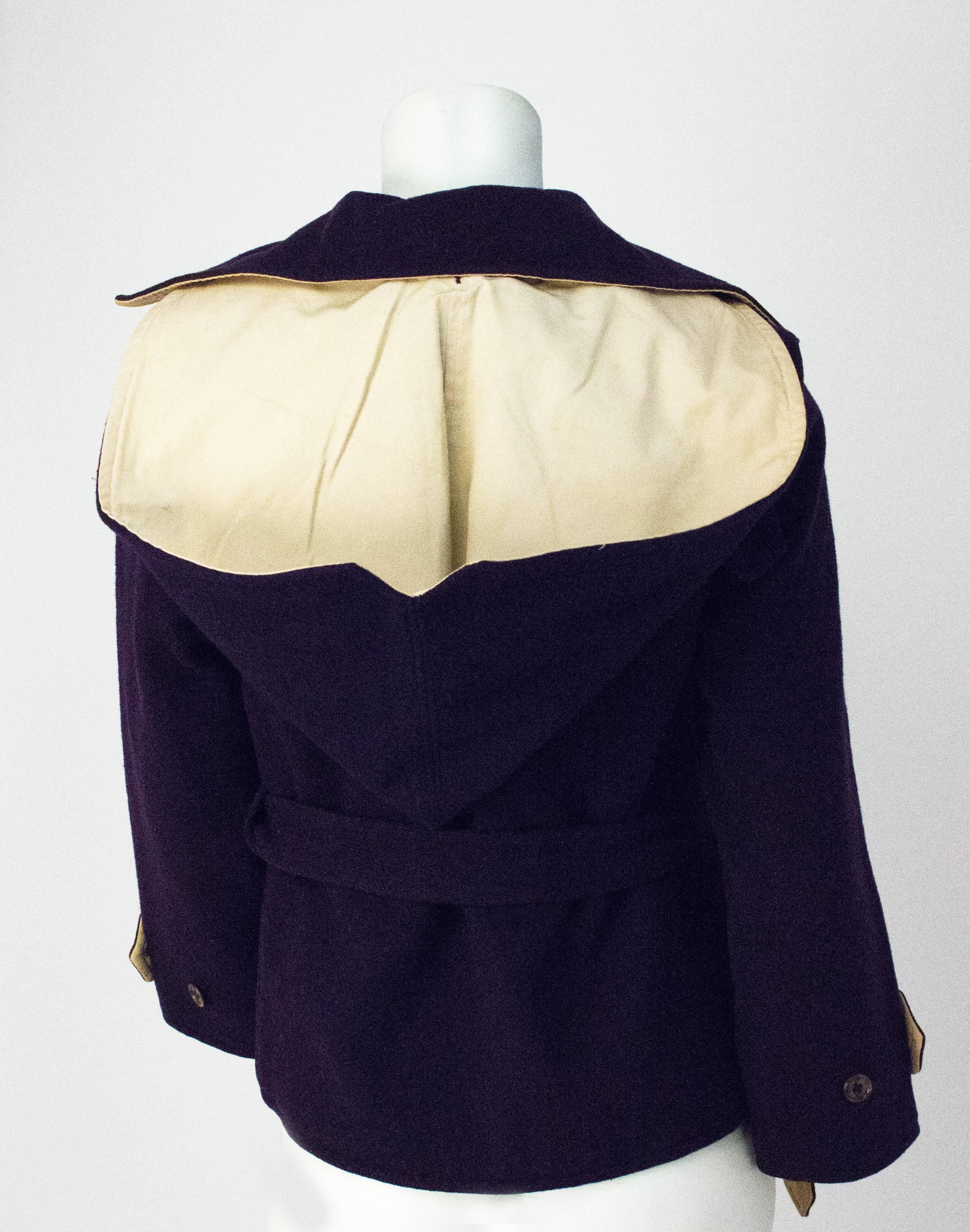 60s Navy Wool Jacket with Pointed Hood. Cotton Lining discolored from age.