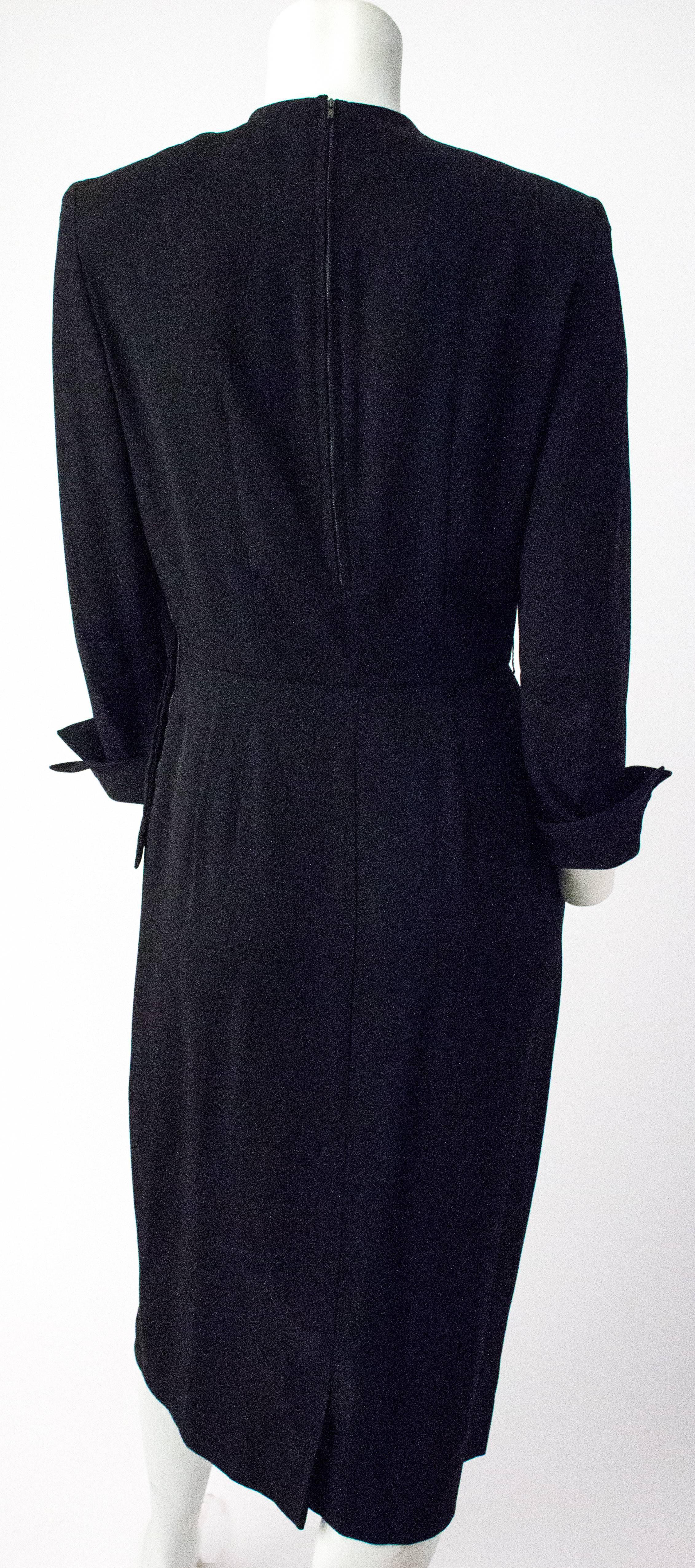 40s Peplum Dress with Velvet Rhinestone Appliqué. Metal zipper up the side. 