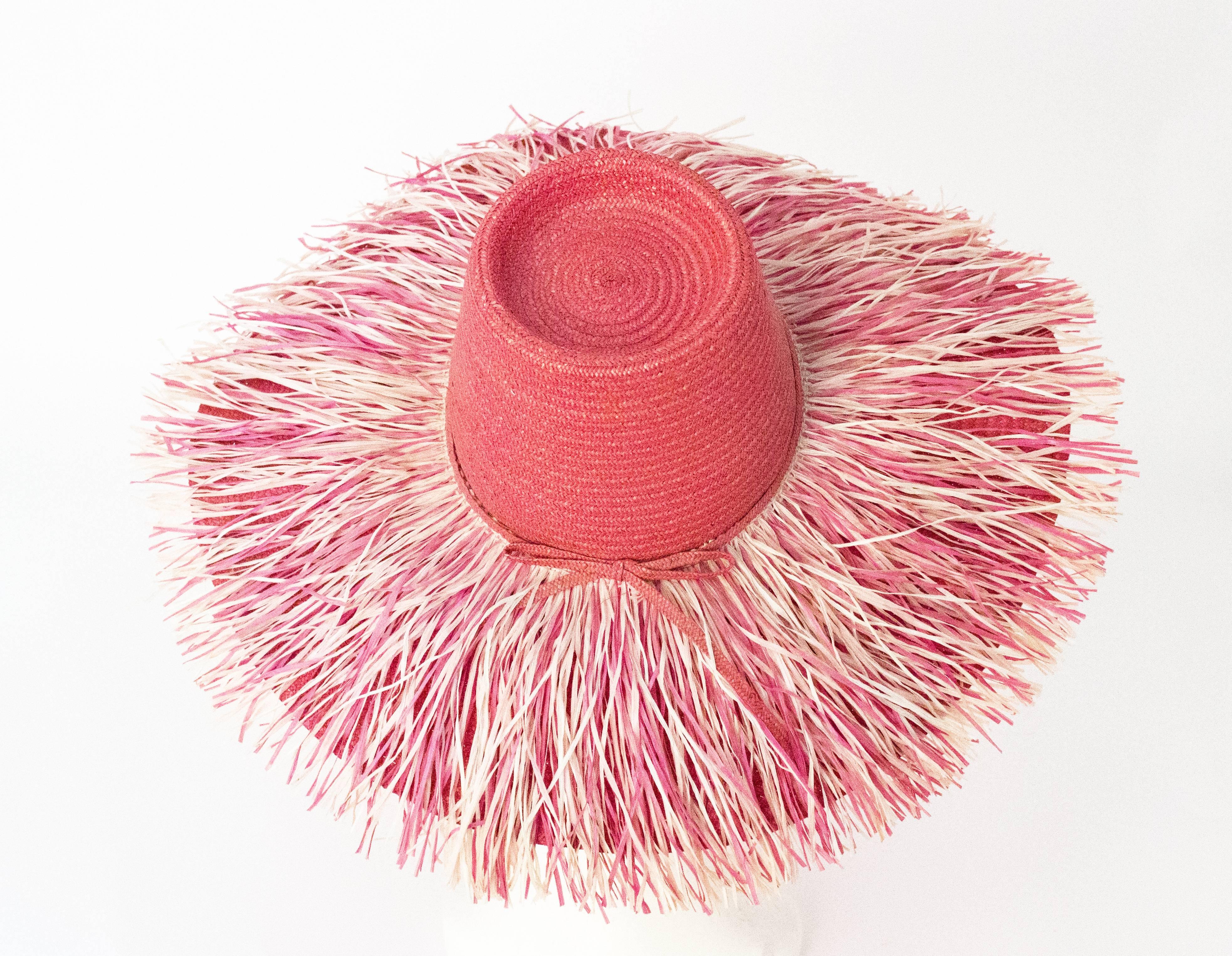 pink straw hats