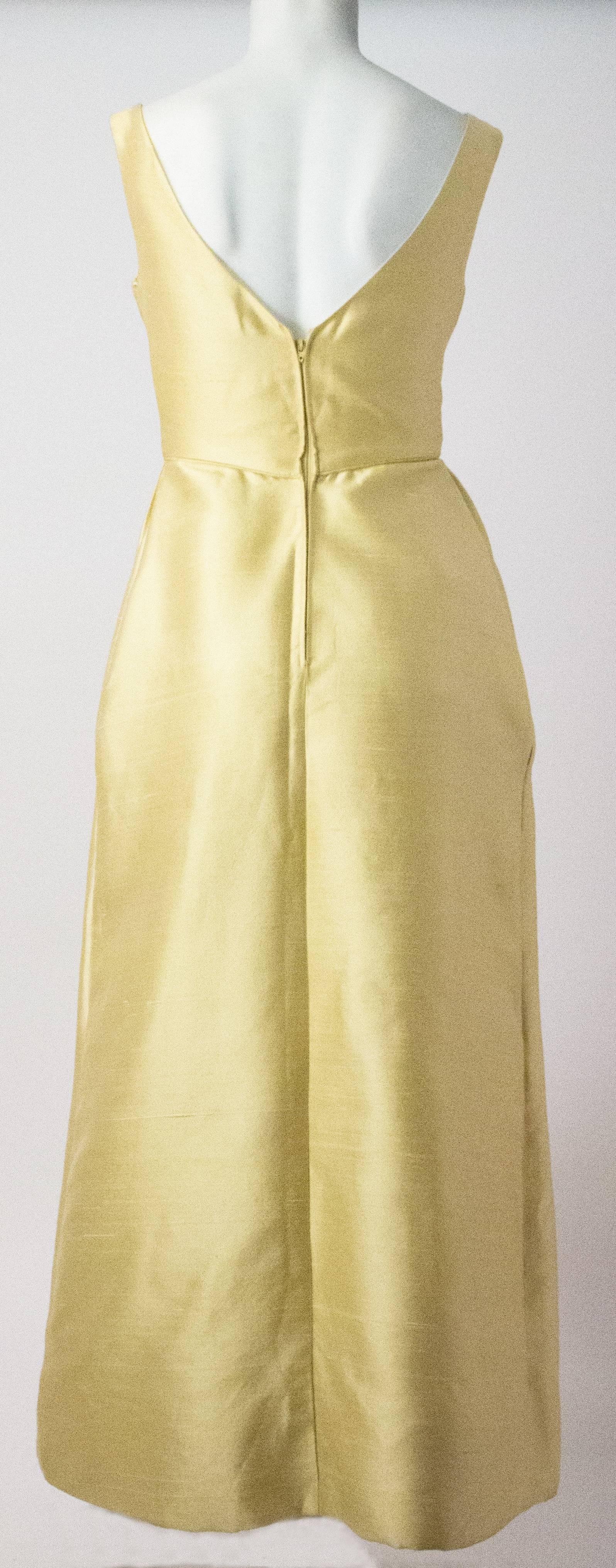 1960s buttercup yellow silk evening dress.
